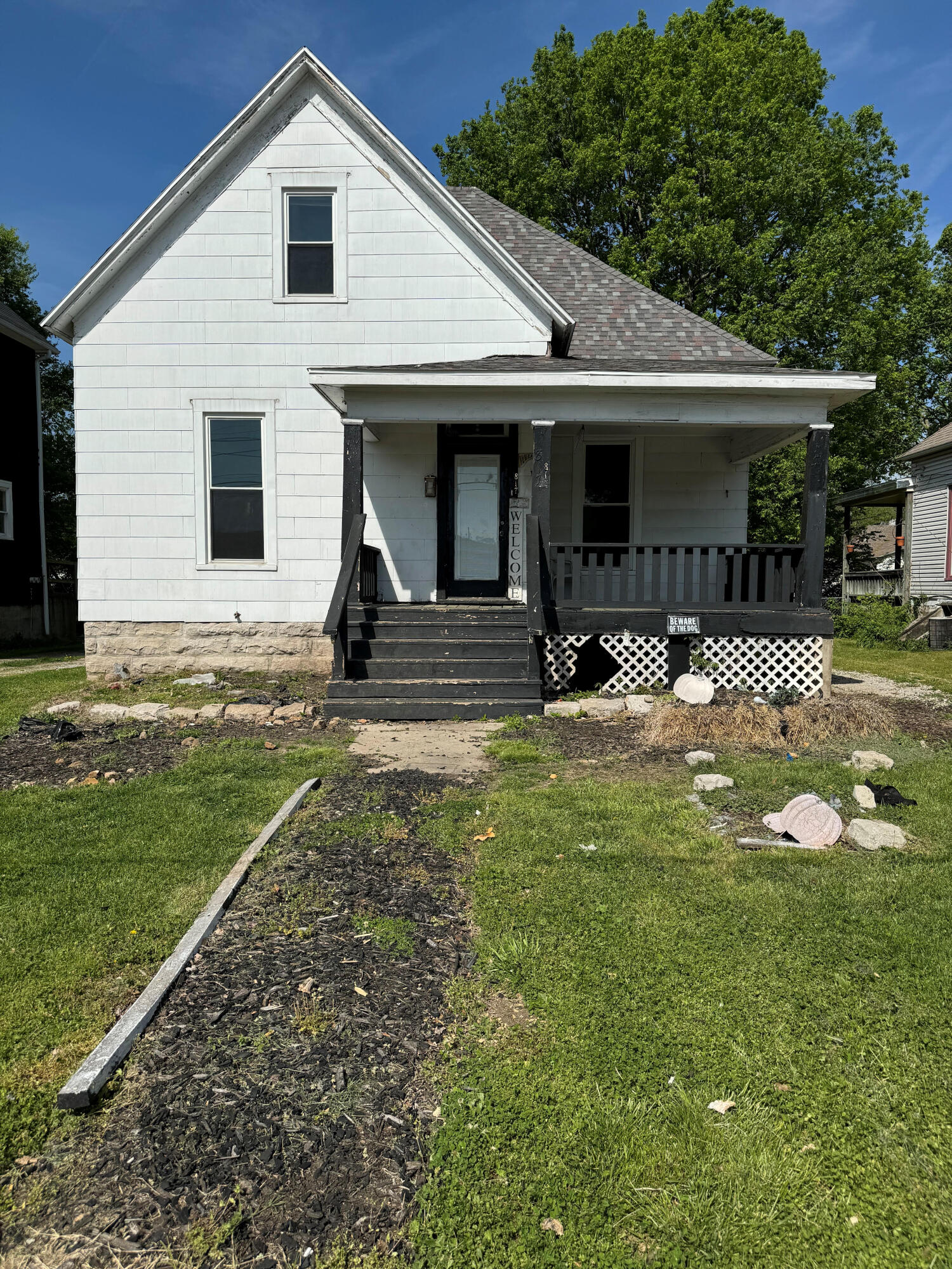 Classic 19th century home with many features found in that era:  high ceilings, extensive woodwork/trim, interior glass doors, hardwood floors., etc.    Home needs TLC to return to its original style.  Close to MSU, downtown, and public transportation.