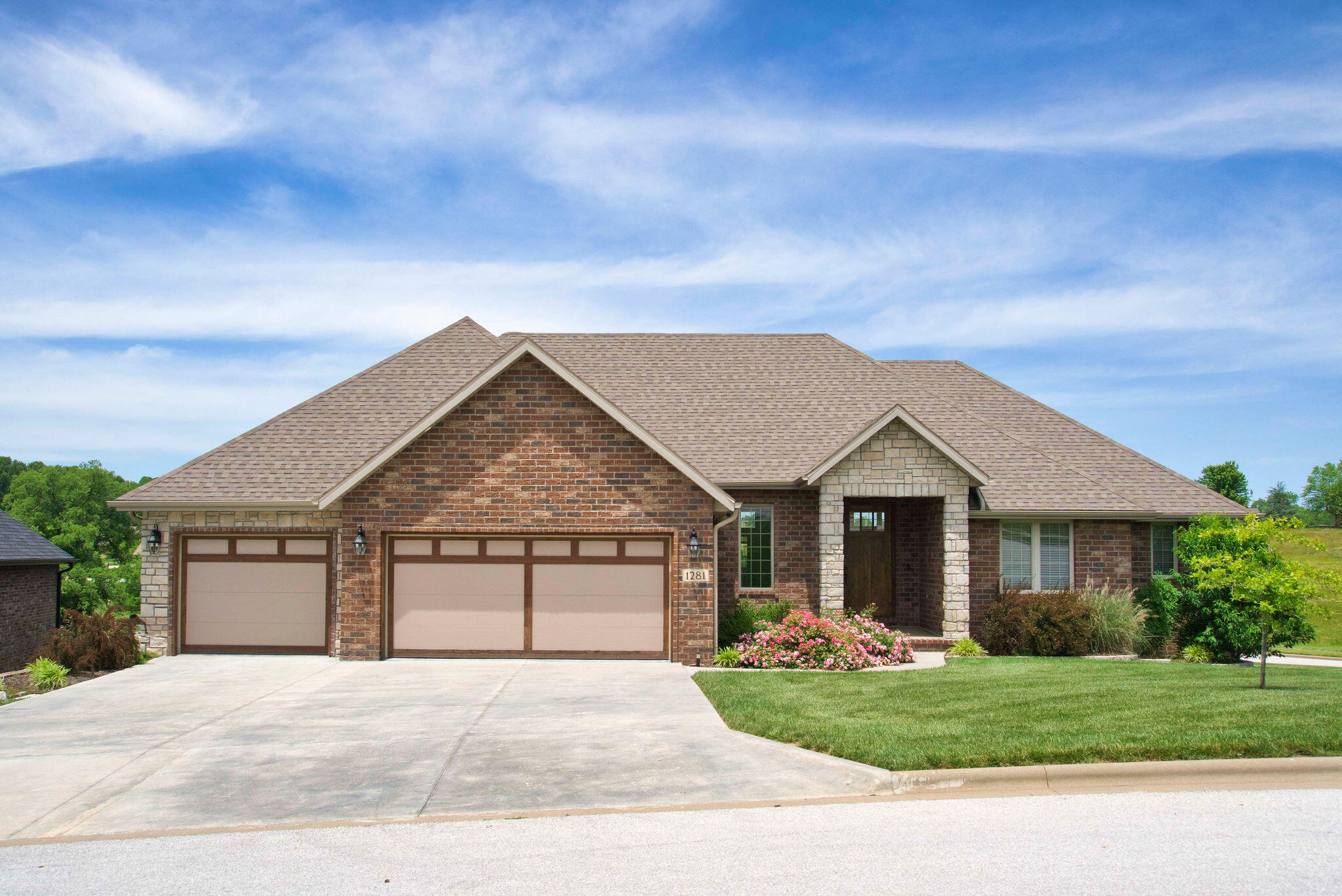 Gorgeous walkout basement home situated on a corner lot in the peaceful subdivision of Kelby Creek. Built in 2019, it shows like brand new!! Fantastic open, split bedroom floor plan. Tall ceiling throughout.....lots of added details  to this home such as the custom ceiling in the dining area. Spacious living room with vaulted ceiling. Large windows allow for an abundance of natural light. Stunning kitchen with custom stained cabinetry, big center island, stainless appliances that include a  gas cooktop, wall oven, refrigerator, dishwasher and microwave. Granite counterops, tiled , and a walk-in pantry. Built in coat rack/bench by the garage door. Separate laundry room. There are three bedrooms on the main floor, one of which is the master bedroom. The mast bath has dual sinks, corner jetted tub, walk-in shower and a great walk-in closet! Downstairs is a huge family/ rec room with a wet bar, three additional bedrooms and a full bath. Enjoy your mornings and evenings on the covered deck overlooking the subdivision lake. Technology upgrades include a nest thermostat, Ring doorbell, 2 Ring security cameras overlooking the walkout basement, smart light switches and light bulbs to automate outdoor and indoor lighting. A water softener has been installed. Neighborhood amenities include 3 beautiful ponds stocked with largemouth Bass, and neighborhood clubhouse with a pool that can be reserved for private gatherings. Clubhouse includes a gym, full kitchen, and outside grills.