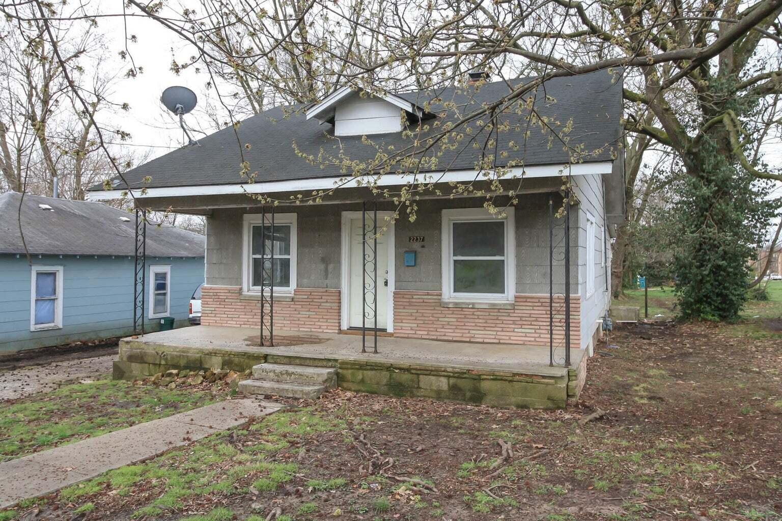 This two bedroom could easily be turned into a three bedroom home. Updates include the bathroom, windows, water heater and furnace. Features include a covered front porch and spacious living room. Property being sold as is.