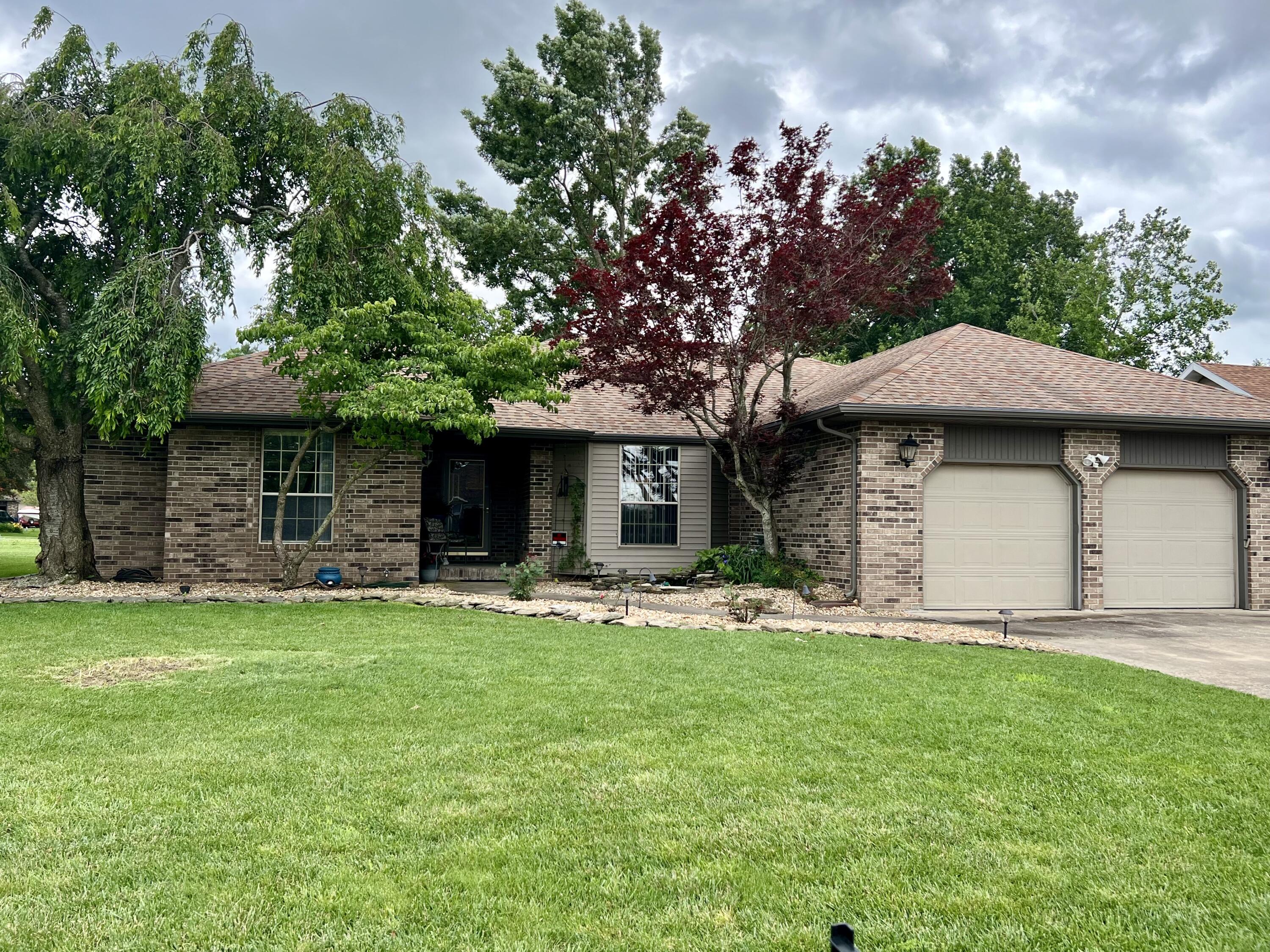 Home pending, no open house on Sunday 6/9.If you are looking for a 3/2/2 home close to all Nixa has to offer, don't miss out on this first time on the market property. A perfect balance between convenience and serenity. The outside landscaping will impress you and inside is complete with new flooring and paint throughout, this home also has a newer roof, HVAC, and oven. All the appliances stay, including the washer and dryer. Enjoy the Summer mornings in your sunroom, or if the weather is nice you can sit by the tranquil coy pond on the sprawling back deck. You will love the split floor plan, large en suite including a walk in closet, and loads of storage in the kitchen. A must see!