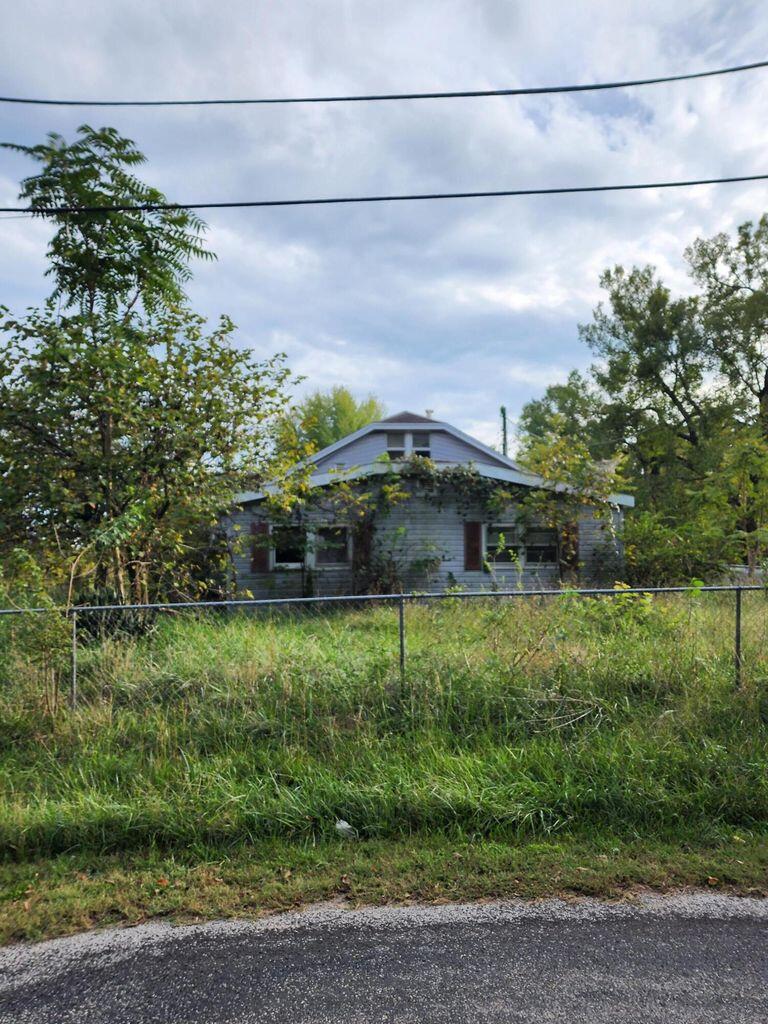 Here is almost 40 acres with Tons of Highway 60 Frontage. The home is a 4 bed 2 bath home that will need a full remodel. Seller is willing to divide lots with the home or without. Please see aerials for the lots. The home on the 13 acre lot is not for sale. There is a 1 acre that will stay with that home. The 12 acres of land left around it is. There is a well on each lot. Here is a great opportunity for someone to have a large piece of land close to town.