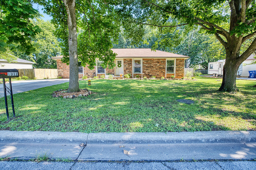 Move in ready 4 bedroom, 2 bath in the heart of Republic. Brand new front door and built in shelves in the living area, new lights almost everywhere, entire house has been painted and new outlets/light switches and under cabinet lighting installed. 2 car detached garage has electric and attic space, work benches will stay. Beautifully landscaped with an enclosed raised bed garden. Shed is currently being used as a chicken coop and there is a chicken run, 4 chickens can stay with the home. Ring doorbell, and both kitchen and garage refrigerators will stay.