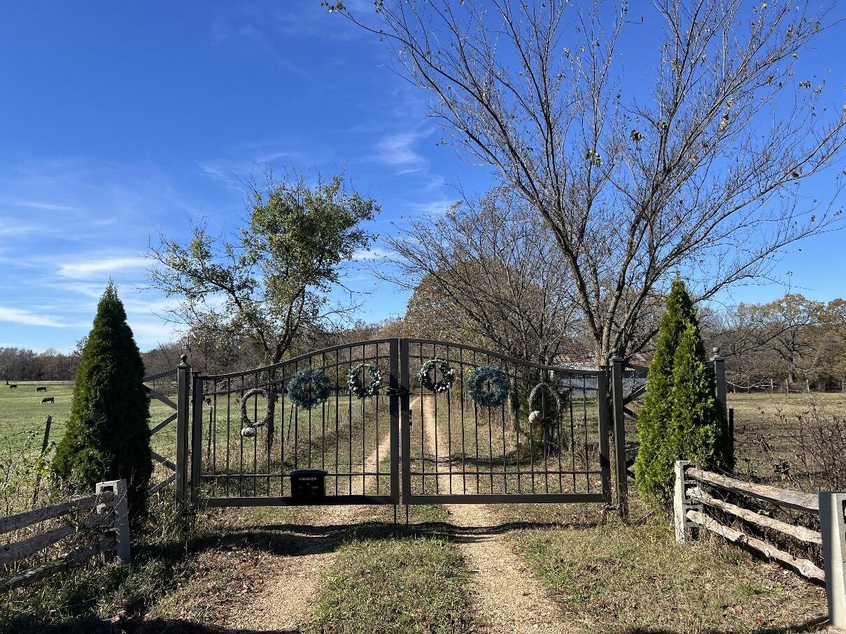 This is  a great and amazing place from busy city life. It is know as one of the best entertain ranches in Lawrence county.The pretty lakes are stocked with game fish, and the woods and fields abound with deer,turkey,quail, rabbits, ducks, geese,etc. The three gorgeous  spring fed lakes are the beauty of the ranch. The comfortable log home, built from trees removed while building the spring fed lakes, has a large open room and kitchen plus a wood stove for winter warmth. Then step out to a huge from porch (10x50) overlooking one of the big lakes.Walk out on the dock and wet a line to catch your dinner. This 160 AC listing of open fields and woodland with over hundred years' hard-wood trees such as walnut, black oak, white oak, post oak, cedar,etc. The forest is tagged and protected by US DA (Department of Agriculture). Besides the lakes & forest for entertainment, there are open land for cattles and horses, with two ponds, one of the pond is spring fed as well. The three outbuildings 43x60, 40x60: #1 is 43x60 with 4 rooms, a 14x29 canning kitchen and butcher shop, a 15x29 auto/truck garage, a 29x29 work shop, and across back is a 14x60 shed roof used to keep goats and chickens behind. #2 is a 40x60 machine/equipment shed.#3 is a 30x70 wood working/cabin shop with a 18x72green house on one side All three buildings have electricity.The first owner of the ranch, who built the ranch, was a well-know attorney. The present owner is a global  financial banking investor.The farm is convenient to Springfield-Branson Airport, within 25 minutes and to the cent Springfield city in 30 minutes and in 40 minutes to Branson, American largest country music city.The ranch features:1.High speed 1 G business FIBER to the house   was buried in 2023;2. Three Lakes with two ponds in the farm;3.Exterior Oak Wood protection of whole cabin house  was done with WOCA in 2017;4. The whole well pipe was replaced in 2016;5. The roof of the well house is newly replaced in 2023;