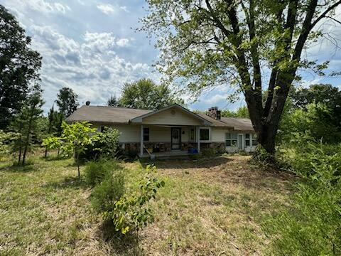 Home and 11 acres on asphalt dead end road! Home is in need of repair but is a very nice home. 2,288 finished sq ft, 3 bedroom, 1.5 bath, living room and family room. Home was originally built in 1978 and completely remodeled in 2006. Outside property lays very nice, there is a 28 X 36  shop building and a pond out back! This could be a very nice home with some TLC and repair! Call today for more information or to schedule your property tour.