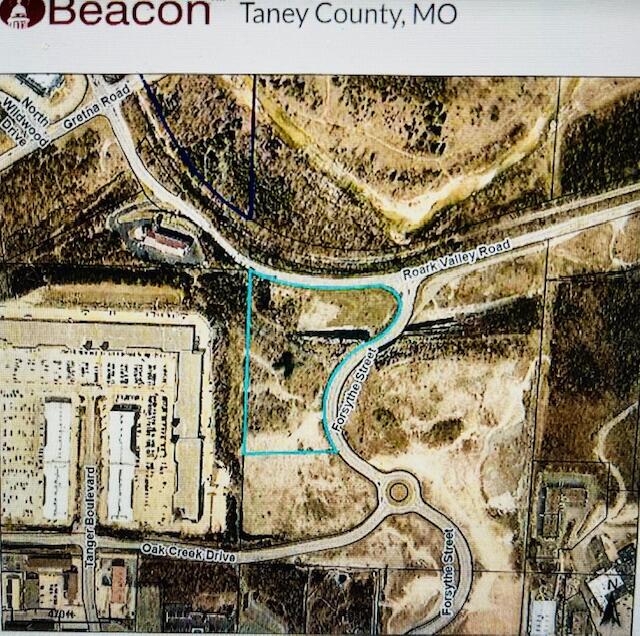 8.34 acres on south side of Roark Valley RD., extending south on the west side of Forsyth St.