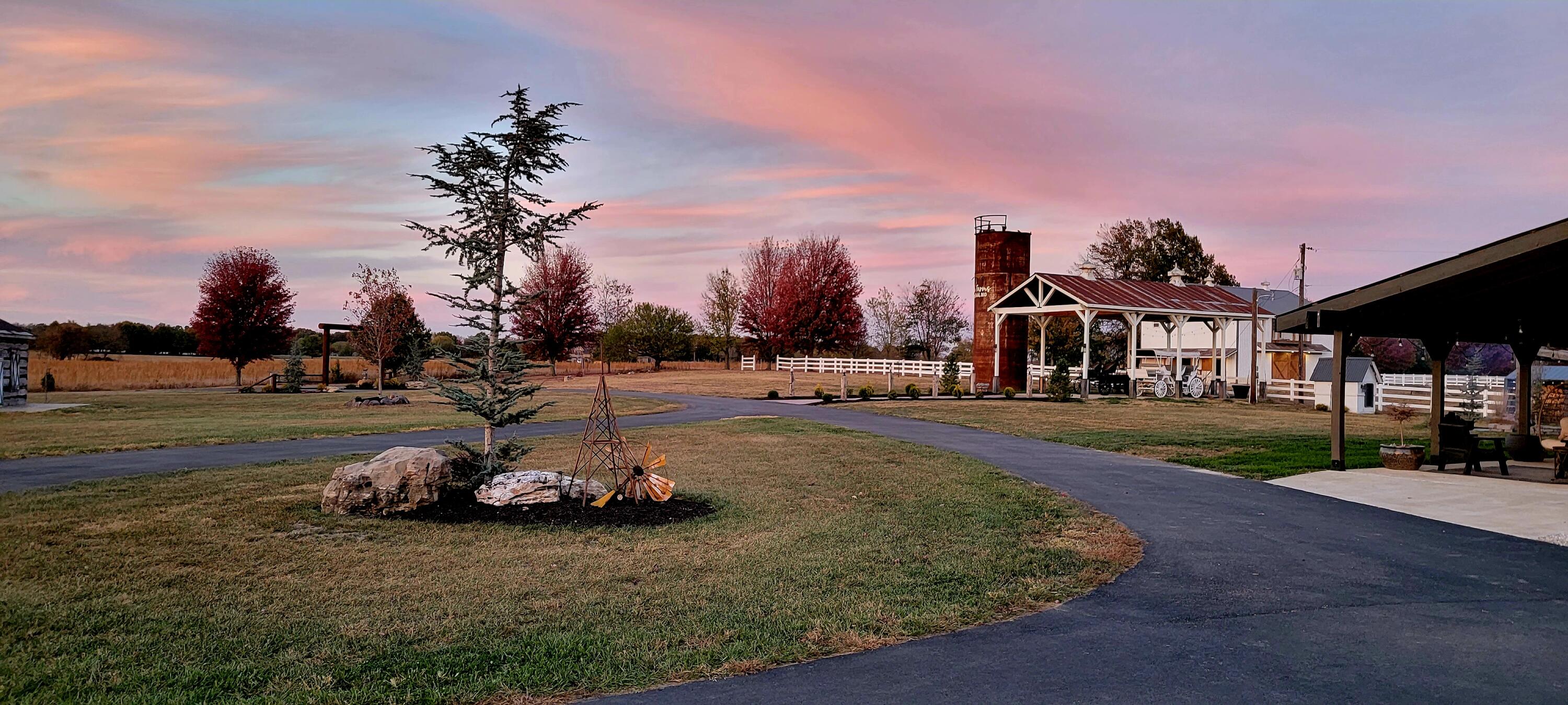 Beautiful farm just minutes from Springfield! This picturesque, gated 11-acre estate is perfect for horses, recreation, and gatherings. The property features a 42x60 barn with tack room, storage loft, automatic fans, large covered patio. There is also an old dairy barn which has been meticulously renovated into a living space with a kitchen, bathroom, and large deck overlooking the pastures. The new barn features large stalls, tack room, feed room, and a second story (unfinished) apartment that is 1700 sq ft. An 1830's log cabin sits on the property overlooking a pond There is a large pavilion that can hold 75 people is equipped with electric. Two pastures are fenced with new vinyl fencing and have heated automatic waterers installed and new loafing sheds. Come see this beautiful farm!