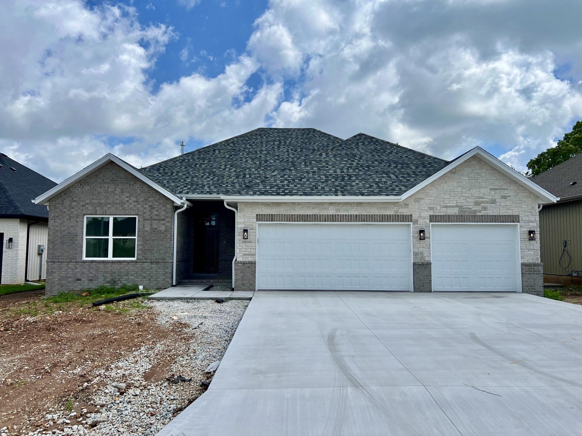 Welcome to Meadowbrooke! A new premier community in the heart of Nixa. This Brand new construction home features 3 bedrooms, 2 full baths, 8 foot entry door, quarts kitchen counters, soaring ceilings, large windows, cozy living room fireplace, stunning custom cabinets and trim throughout, oversized 3 car garage, covered back deck, large walk-in pantry, SS appliances, elegant lighting, and so much more! Come and see for yourself and make this your dream home!