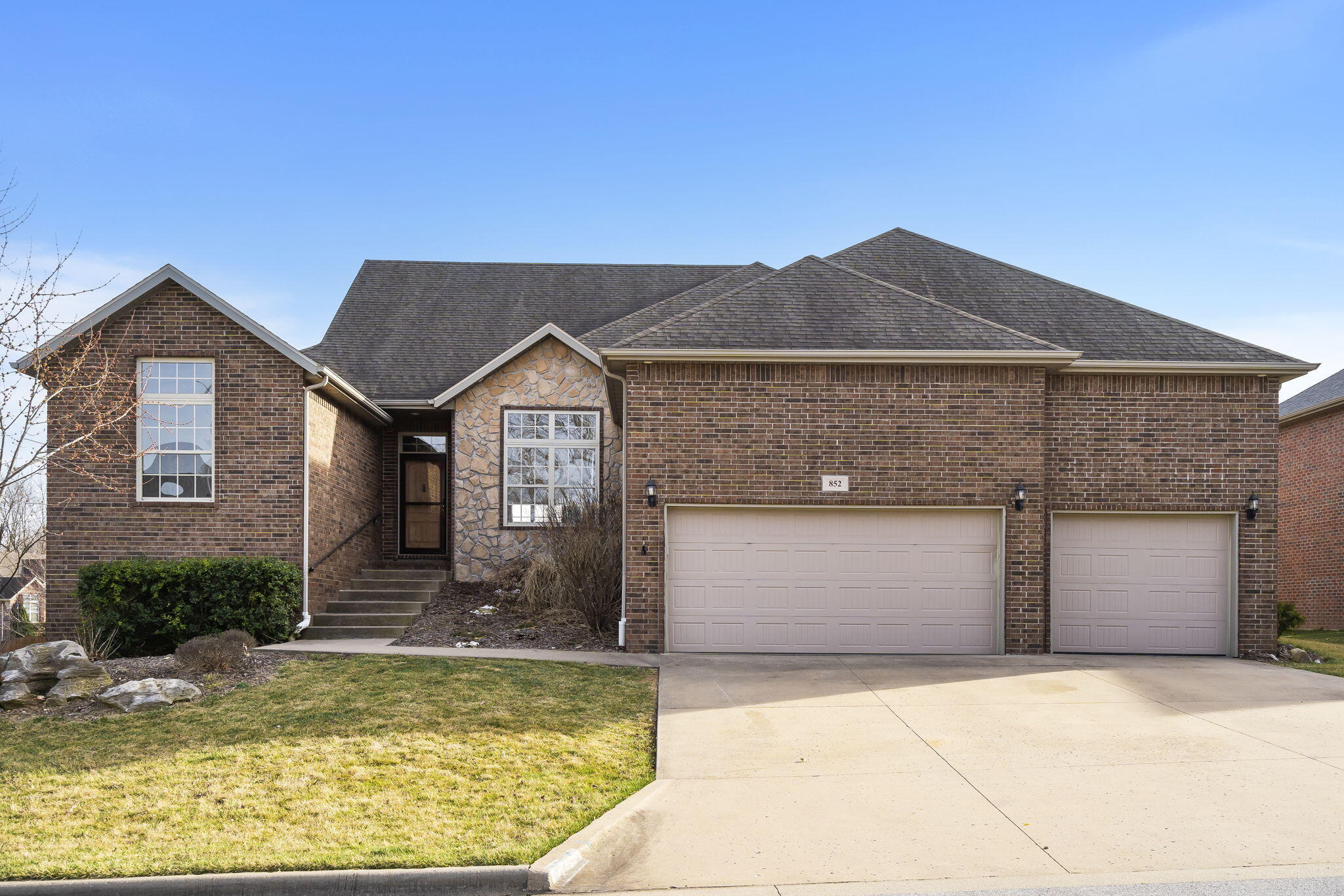 Stunning walk-out basement home on over 1/2 an acre double lot in Nixa!  Offering over 5000 SF with 6 beds + office, 4.5 baths, updates throughout, a wet bar, granite counters, and more!  Inside, you are greeted by a formal dining room, fresh paint, and refinished hardwood floors.  The bright living room has tall ceilings and a see-through fireplace into the kitchen.  The kitchen features a large center island with bar seating, granite counters, stainless appliances, tile backsplash, and breakfast nook with bay windows.  You will also love the walk-in pantry, nearby laundry room, and powder room.  The large primary suite provides tray ceilings, access to the back deck, a walk-in closet, dual vanities, jetted tub, and walk-in shower.  The main floor is completed by 3 more bedrooms and a full bathroom.  You will be impressed by the spaciousness of the basement that includes a wet bar, stone fireplace, John Deere room, media room, 2 more bedrooms (one is a 2nd suite), an office space, and 2 full bathrooms.  The backyard offers a full wood privacy fence and an amazing deck and patio.  Other amazing features include: a super clean storage shed with 2 levels of storage space, garden beds, and a swing set.  The extras are endless in this home, it is an absolute must-see!  Located on a quiet cul-de-sac with quick access to Hwy 14.
