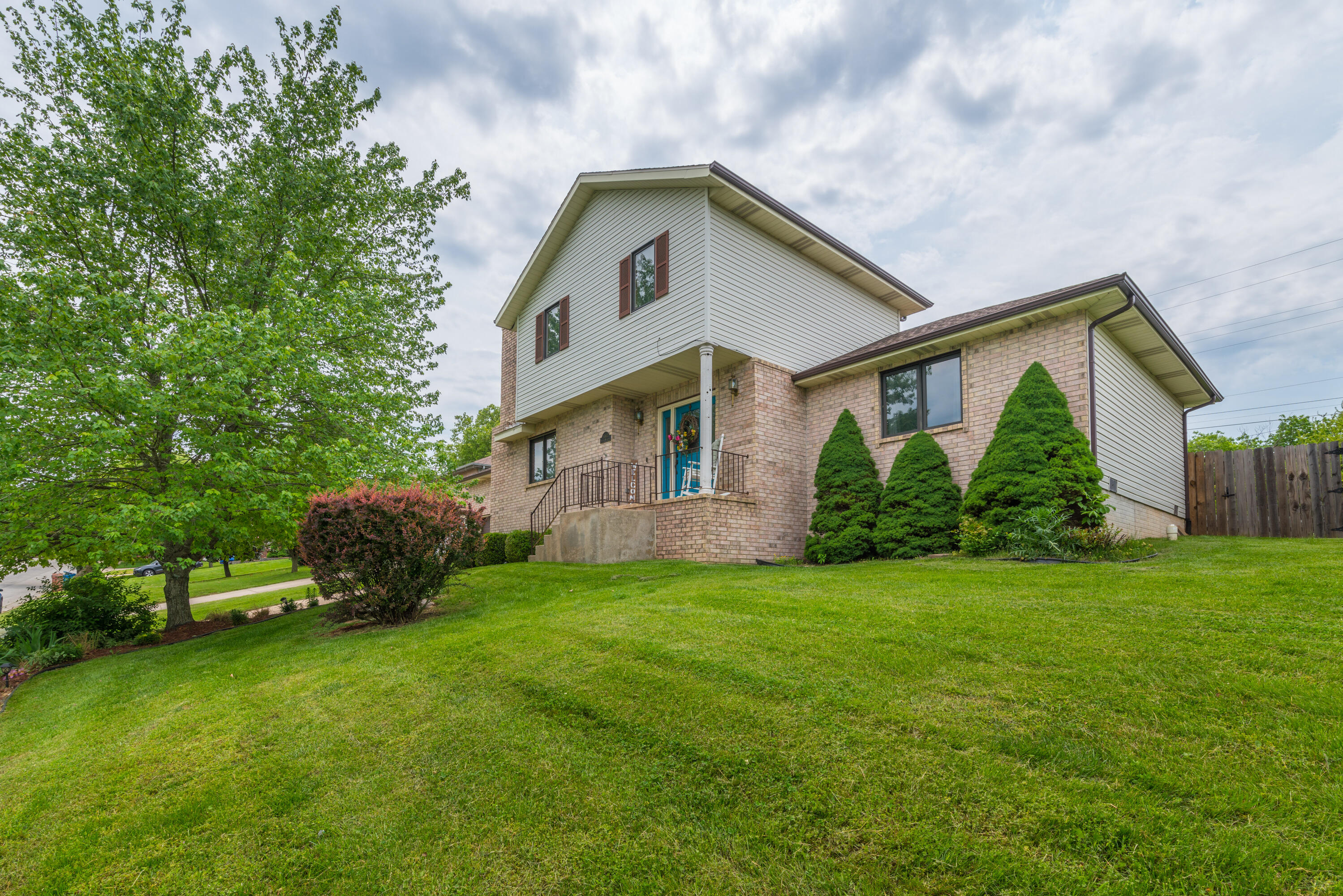 This lovely 3 bedroom, 2.5 bathroom, one and 1/2 story home features a spacious great room with a brick fireplace and tray ceilings. High-grade laminate flooring highlights the entire first floor including the large primary bedroom with ensuite bath and two closets. The kitchen allows plenty of room to cook and then serve your meal in the adjoining dining room with its own tray ceiling. There is a covered deck in back to look over a generously sized fenced back yard. Upstairs there are two more bedrooms, a full bathroom, and a huge walk-in closet. The roof and gutters were replaced in 2020. A Nest thermostat and doorbell will stay with the home. The Sellers will need some flexibility on closing date in order to secure their replacement home.