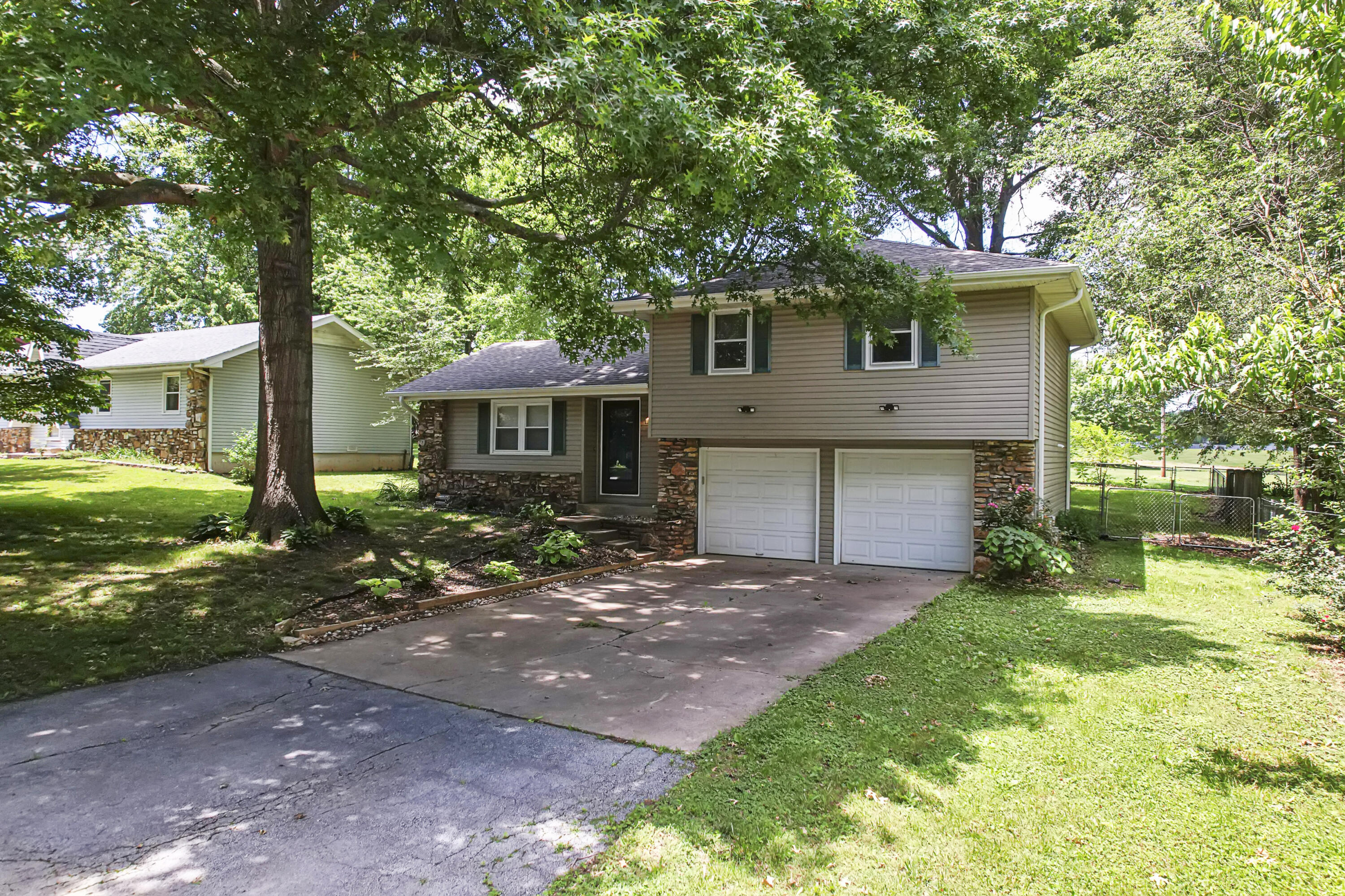 This Beutiful home is located in a great subdivision and backs up to the park you will not find another one like this. The large back yard also offers a nice deck as well as two drive though gates to allow you to pull in your RV or boat. The home offers 3 bedroom and 1 bath and is move in ready.  The wood burning stove is brand new and is ready to keep you warm through the winter. this home has been well cared for a new roof was put on in may of 2022 and seamless gutters were installed in 2021. The home is priced to sell and will not last long call today for your private showing.