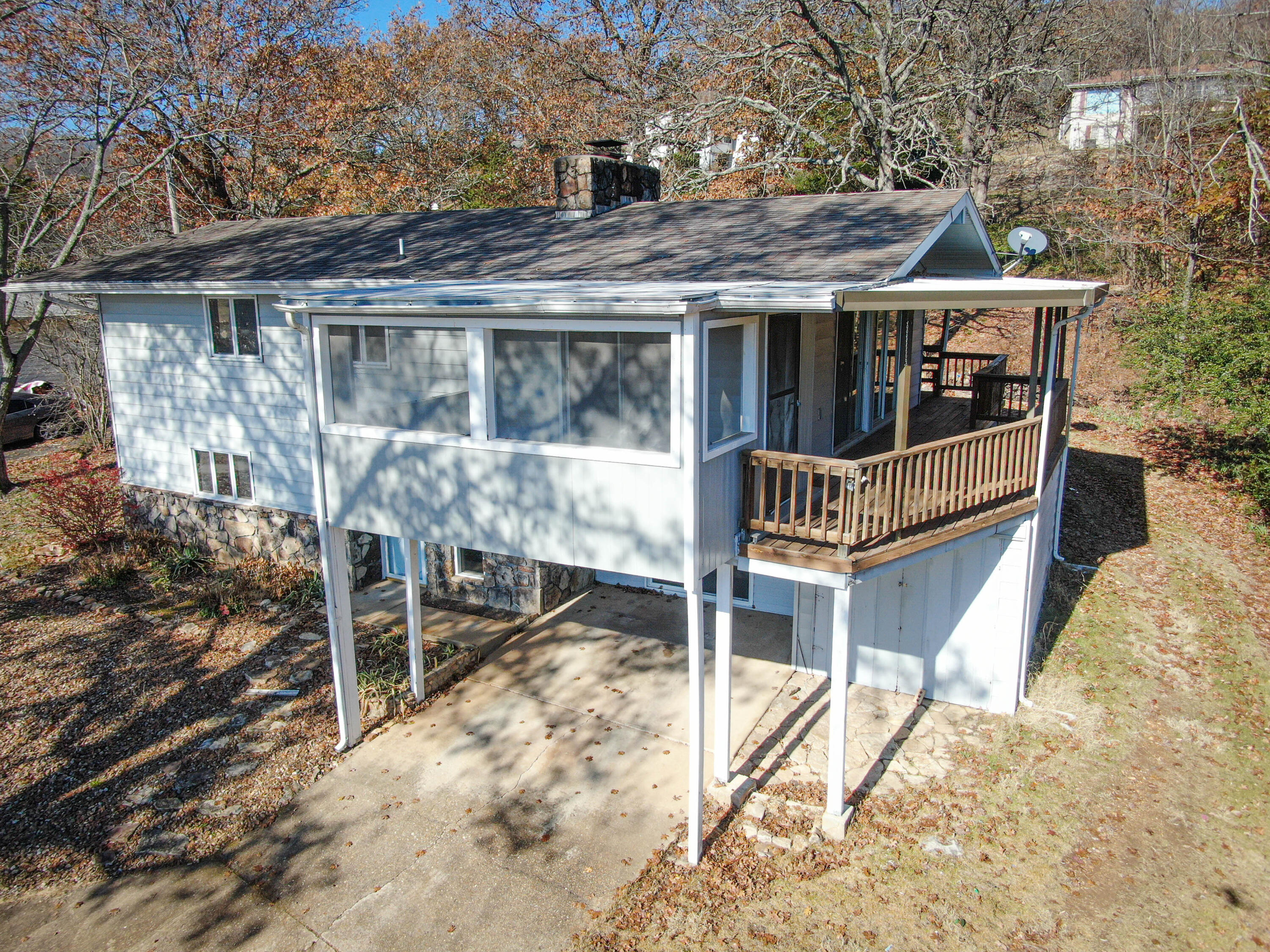 This convenient Kimberling Hills walkout basement home offers four bedrooms, two baths with views of Table Rock Lake and is on a quiet street with good privacy. Southern exposure, good natural light, plenty of covered deck space, wood burning stone fireplace with insert, new furnace and AC in 2021. Grocery, marina, restaurants and shops just minutes away.