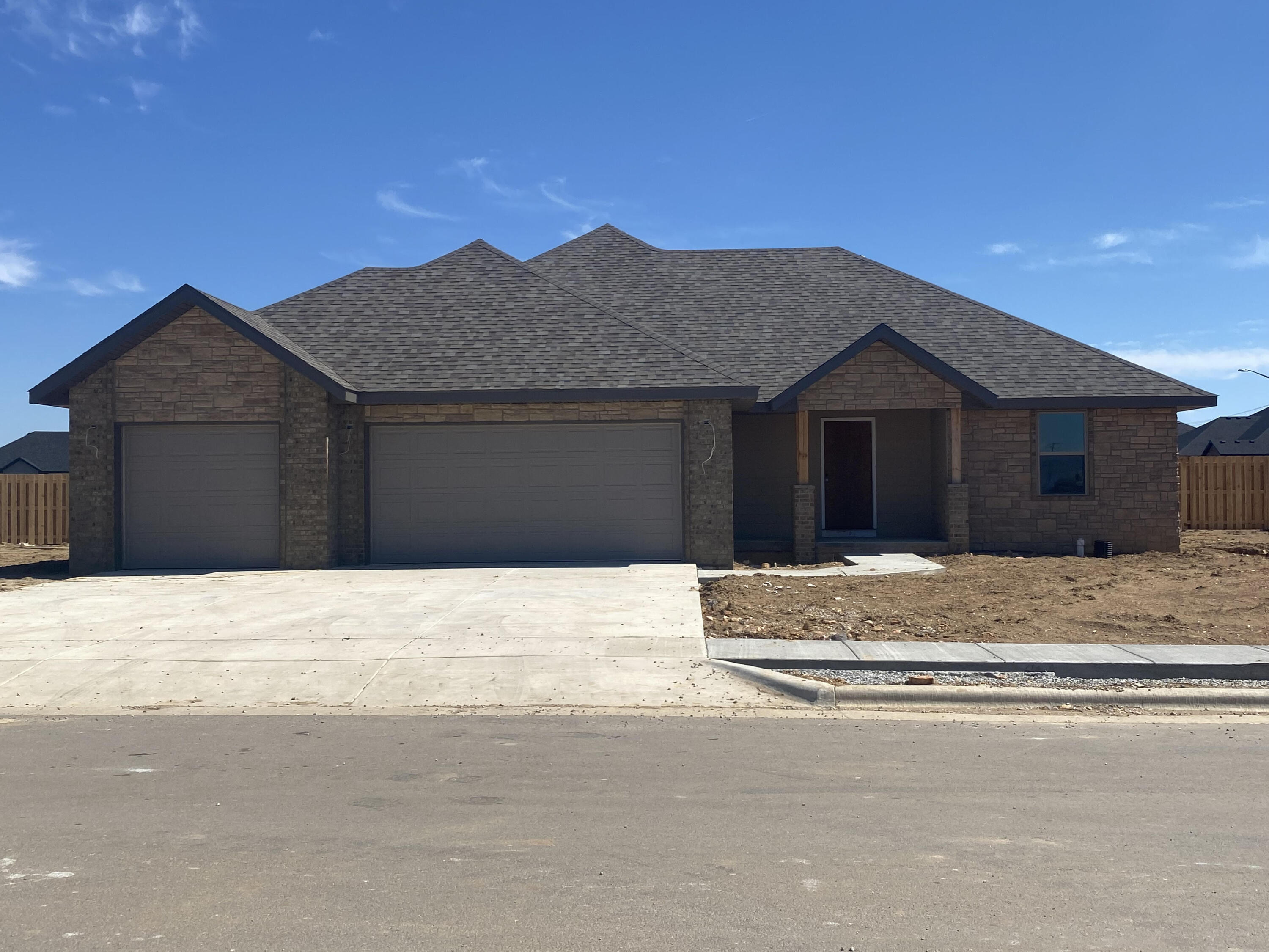 New construction located in Olde World Estates in Ozark! 3 Bedroom/2 bath with fireplace, cathedral ceilings, open floor plan and covered back porch.  Yard will be full sod and irrigated. Large corner lot with privacy fenced backyard.