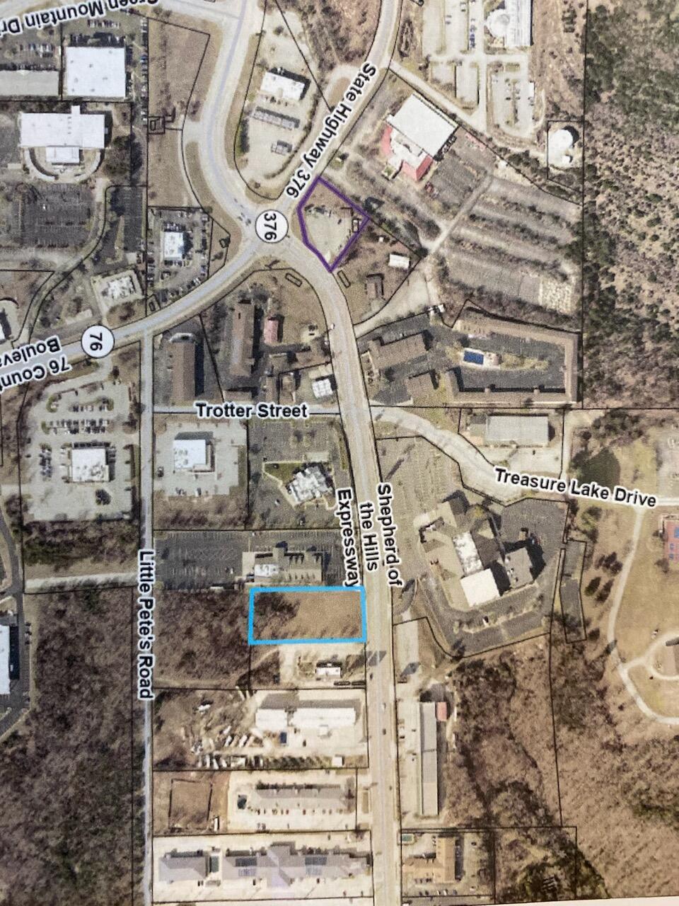 PRIME HIGH-TRAFFIC COUNT COMMERCIAL LOCATION - NOT MANY OF THESE LEFT!! Price just lowered on this Prime commercial lot (1.21 LEVEL Acres)across the street from IMAX Entertainment Complex and located between Taco Bell and Golden Corral. Has 159 feet of Shepherd of the Hills Expressway Frontage with large curb cut already in place. All utilities are at the curb! Within walking distance to many of the Branson area hotels, attractions, and theatres, makes this a great opportunity for many purposes. Zoned Community Commercial.