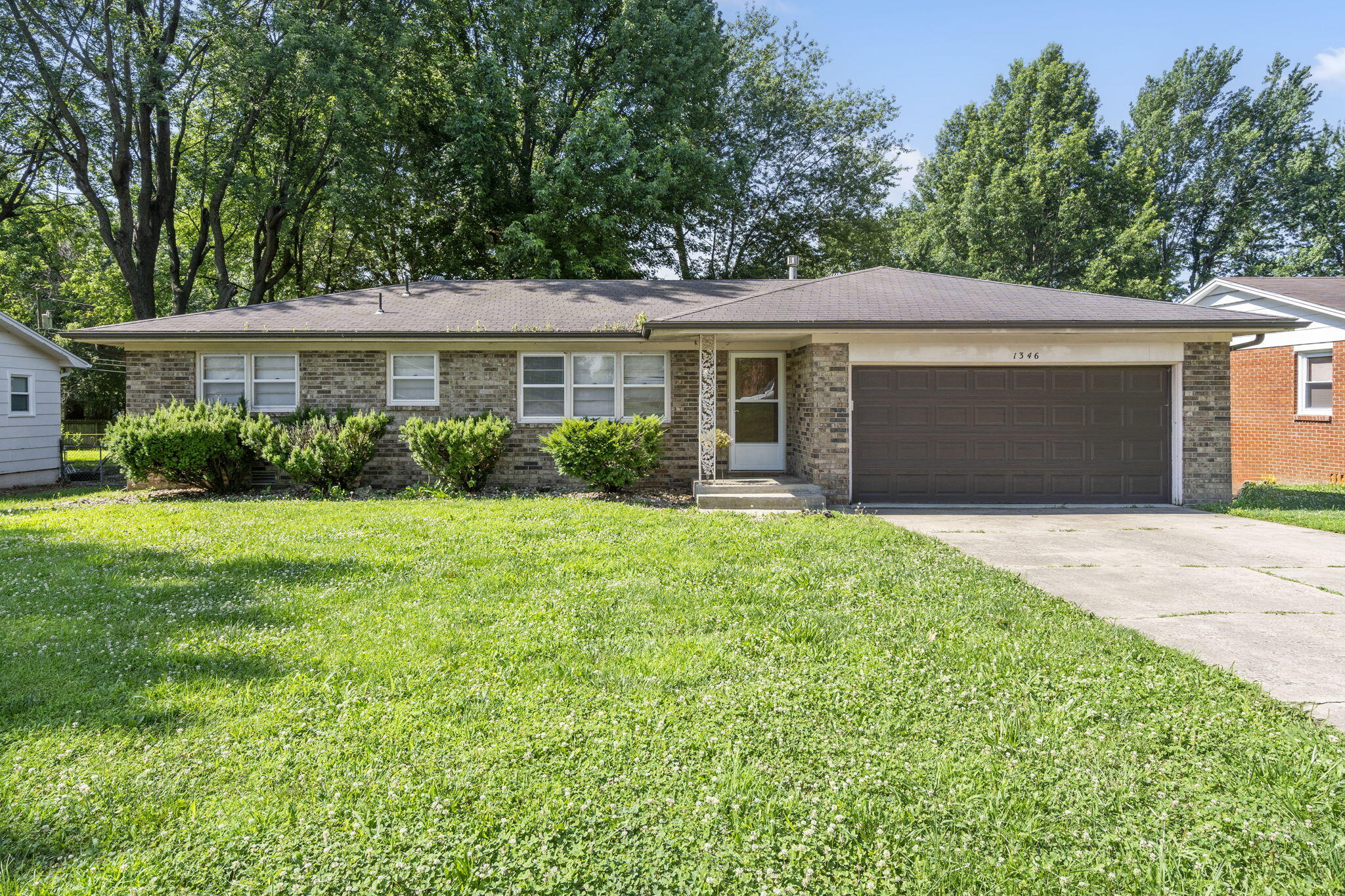 Welcome to 1346 E Bonaire Ct! This charming home boasts an all-brick exterior, a fenced backyard perfect for outdoor activities, and a spacious kitchen ideal for cooking and entertaining. The primary bedroom features an en-suite bathroom for added convenience. With a new park being built just down the road, this could be your next home!
