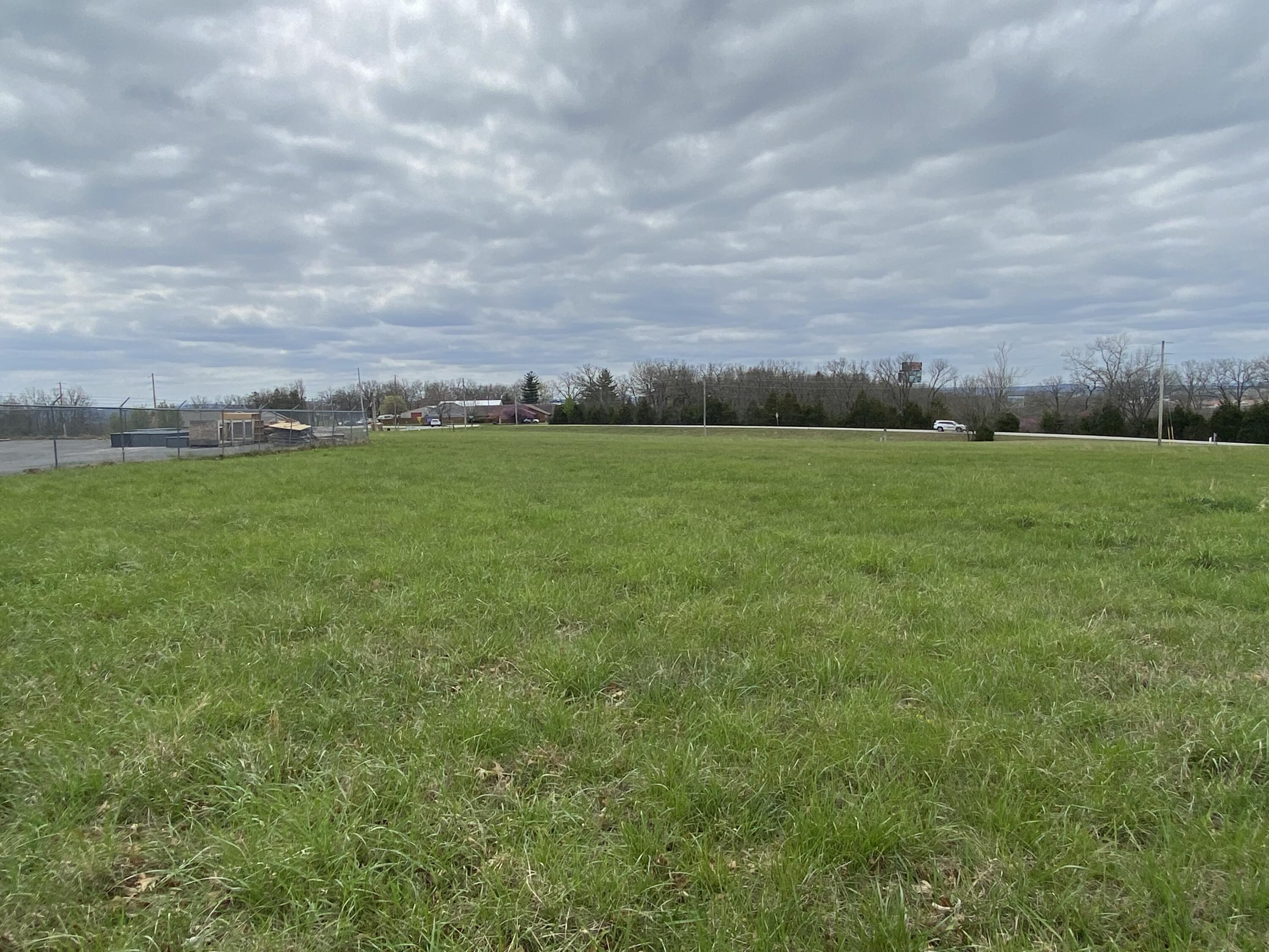 Outstanding Commercial Tract in Branson Missouri. This 6.3 acre tract is strategically located just off busy US Highway 65 and Ozark Mountain Highroad in Branson Missouri.  The entire property is zoned C-2 General Commercial with most all commercial uses permitted.  Utilities ie water, sewer & electric are located on Rosewood Drive.  The site is slightly sloping and open. The tract has frontages on Rosewood Dr., Rinehart Road and Claremont Dr. Easy access from Hwy 65 at Ozark Mountain Highroad exit, then Outer Road to Rinehart Rd.Taney County Parcel # 08-5.0-16-000-000-012.004Owner will consider subdividing.