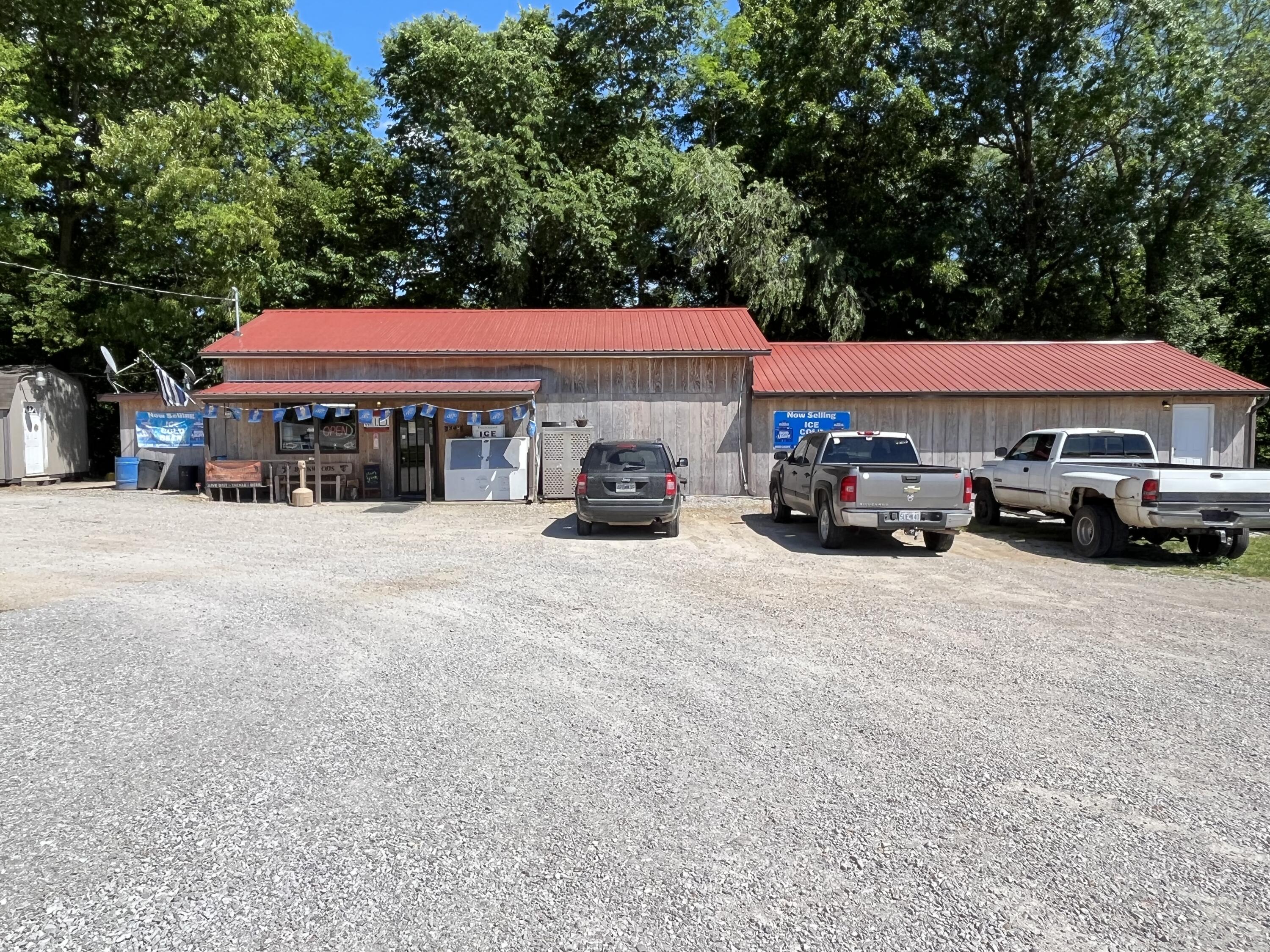 Booming business just south of Ava. Fully functional convenience store, live bait shop and kitchen, recently remodeled and open for business. Comes with stocked with inventory items, including live bait, soda, and food items. 1.5 acres with extra lot to add dwelling if needed.