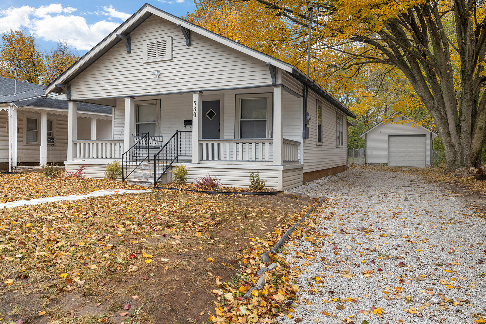 Lovingly restored home. New roof on house and garage. Some new windows. New central air, new kitchen, updated bath and closets, updated wiring, new plumbing, new paint inside and out, insulated attic, hanging storage maximized in main bedroom closet. Fabulous front porch with porch swing. New water heater. Electric to garage. Large fenced yard. Concrete basement. All appliances included.