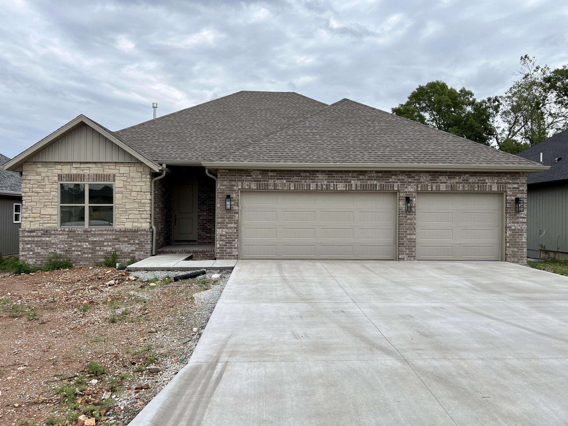 Welcome to Meadowbrooke! A new premier community in the heart of Nixa. This Brand new construction home features 3 bedrooms, 2 full baths, 8 foot entry door, quartz kitchen counters, soaring ceilings, large windows, cozy living room fireplace, stunning custom cabinets and trim throughout, oversized 3 car garage, covered back deck, large walk-in pantry, SS appliances, elegant lighting, and so much more! Come and see for yourself and make this your dream home!