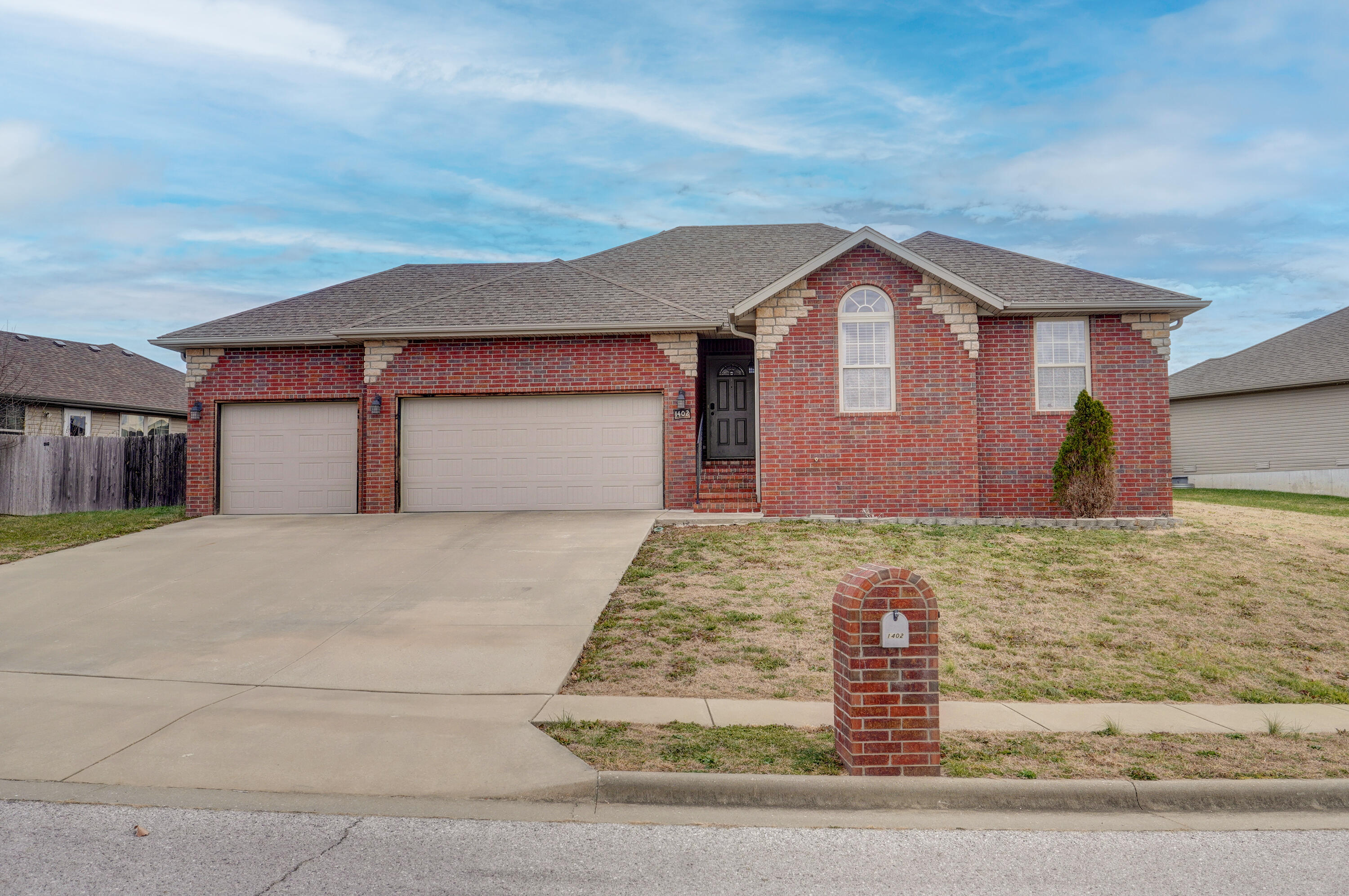 Discover this Beautiful Ozark Home that's situated in a fantastic location, making it the perfect place to call home.The open concept floor plan boasts split bedrooms, cathedral ceilings, custom cabinets, and granite countertops throughout. The spacious master suite features a large walk-in closet and tall trayed ceilings. You'll also have access to a huge three-car garage with built-in storage. This home is packed with high-end features at an unbeatable price. Plus, it's perfectly located for those with an active lifestyle. Enjoy proximity to the Finley River Park, Ozark Mill, Neal Grubaugh City Pool, and the Ozark Disc Golf Course. Don't wait, schedule a visit today!
