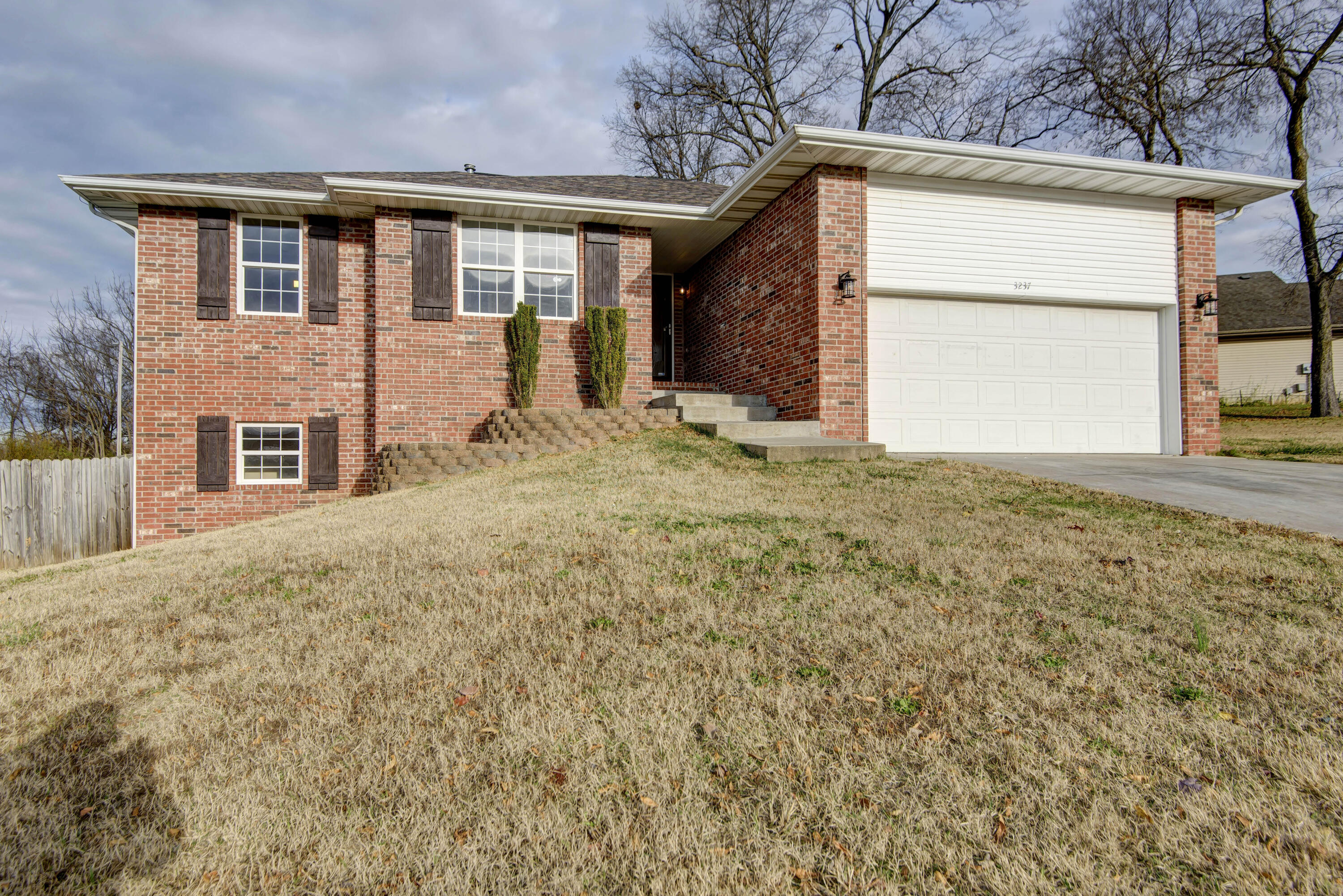 BRAND NEW ROOF and fresh new paint on every wall, ceiling and door welcomes you to this roomy and open SW Springfield home.  There is so much room you may have trouble filling it up. The main level has an open kitchen with brand new appliances, 3 bedrooms and 2 full baths, while the lower level boasts a huge media room, another large bonus room, a full bath and a large additional room that could easily be converted to a 4th bedroom or John Deere room. To round it out, the home is located on a dead end road, on almost a half-acre and has a fully fenced back yard with large deck and firepit. Ready for a quick close! Come check it out.