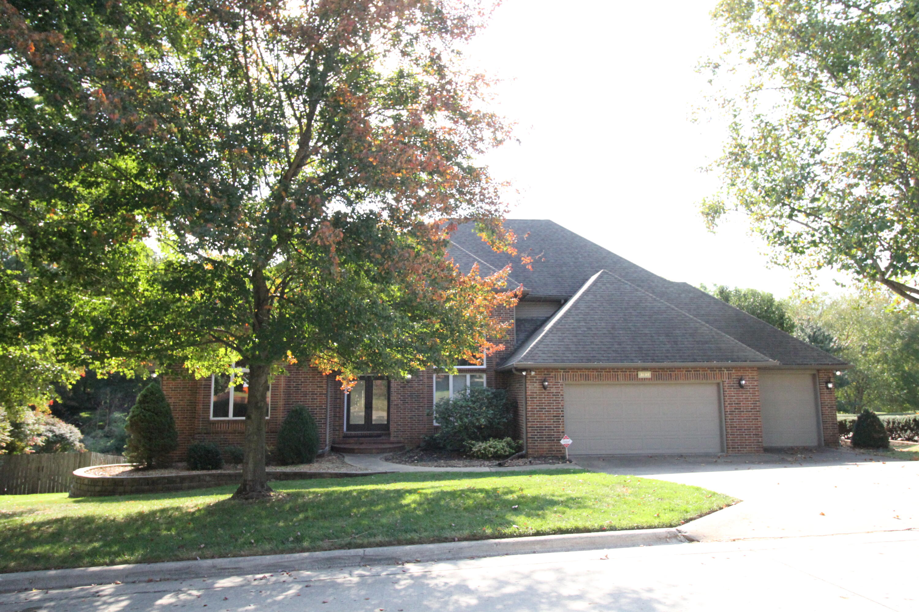 OPEN SUNDAY, OCTOBER 13, 2024:  1:00-3:00 P.M:  Over 7,100 sq. ft. in this one of a kind home in Ravenwood South.  Home was extensively remodeled.  1.5 story home with walkout basement.  Main level has fantastic kitchen with massive island with granite countertops, double oven, gas cooktop and Frigidaire refrigerator/freezer. Great room has cathedral ceiling, skylights and wood burning fireplace.  Formal dining room has 17 ft. ceiling.  Master bath is spectacular.  2 separate vanities, jetted tub, sauna,  extra large closet plus a cedar lined closet.  Sitting area off master bath has fireplace with space you can enjoy your morning coffee.  Spiral staircase leads to the basement office that has another fireplace and library plus a 1/2 bath.  Basement also has large family room with a wood burning fireplace, wet bar, 5th bedroom with 4th full bath plus a media room that seats 8.  Workout or play room could also be used for your pool table.  Wine cellar off wet bar area. 2nd floor has 3 bedrooms and 2 full baths plus a computer / study area. John Deere Room (21 X 9.5) is located under covered patio.  Relaxing back yard is located next to Lake Springfield Park.