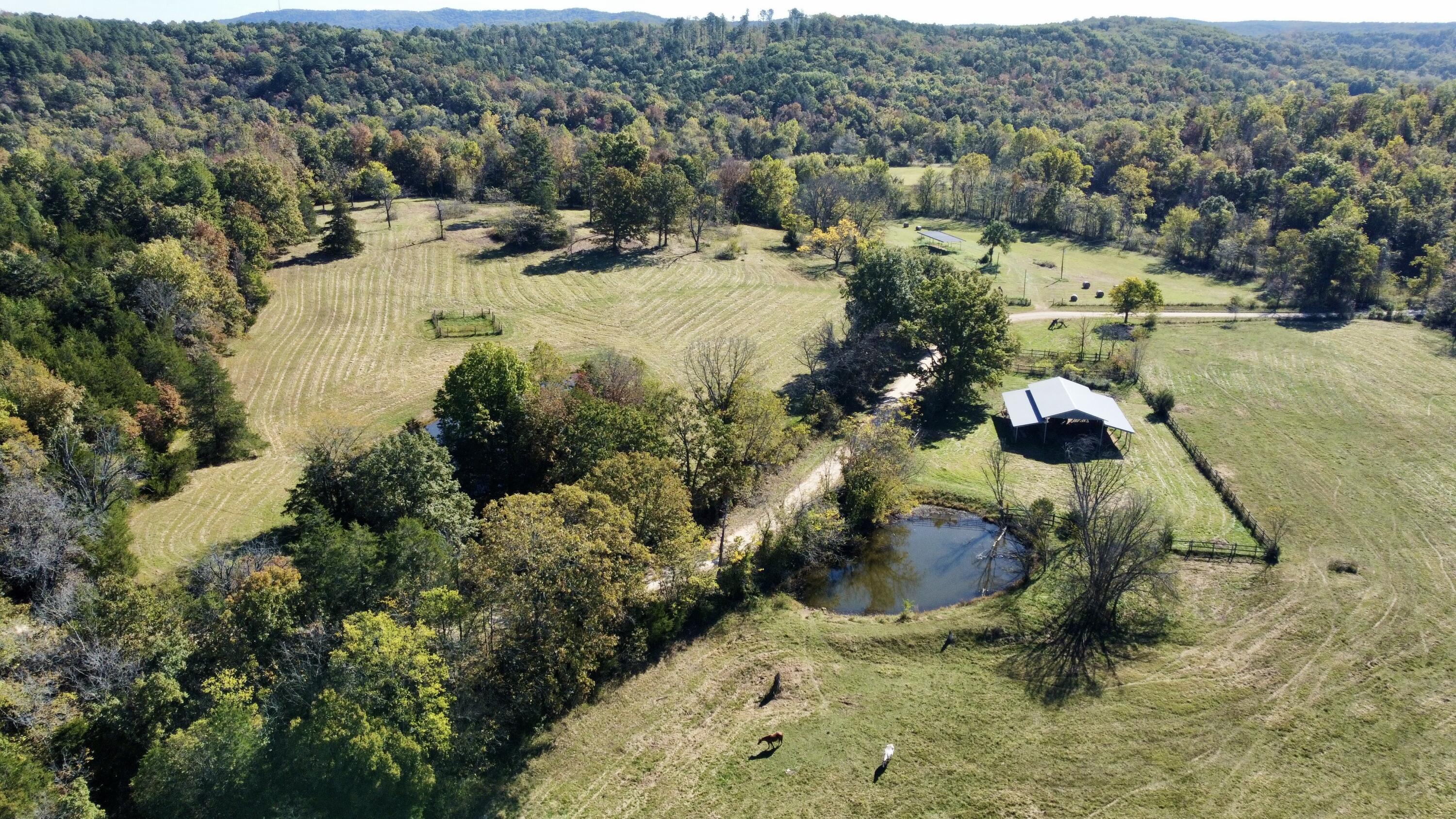 Absolutely beautiful 140 acre +/- Farm just a short 5 miles west from the town of Van Buren! This farm has just about every amenity you'd need to get started with your own cattle/horse operation or expand your existing operation.  Featuring a 50x80 haybarn with two lean-tos and multiple cattle waterers spread throughout the property.  This place is fenced and cross-fenced for rotational grazing and has power available at many locations on the farm. The easterly portion of the farm joins the US Forest Service, and the Deer Huning is superb on this place. There is an existing well on the property located right below the finest house location on the property offering views north and south of the fields and barn below. The current owners will also finance this place with very competitive rates please inquire. Farms with these amenities rarely hit the market in the Van Buren area and this one is a 'Must See'.