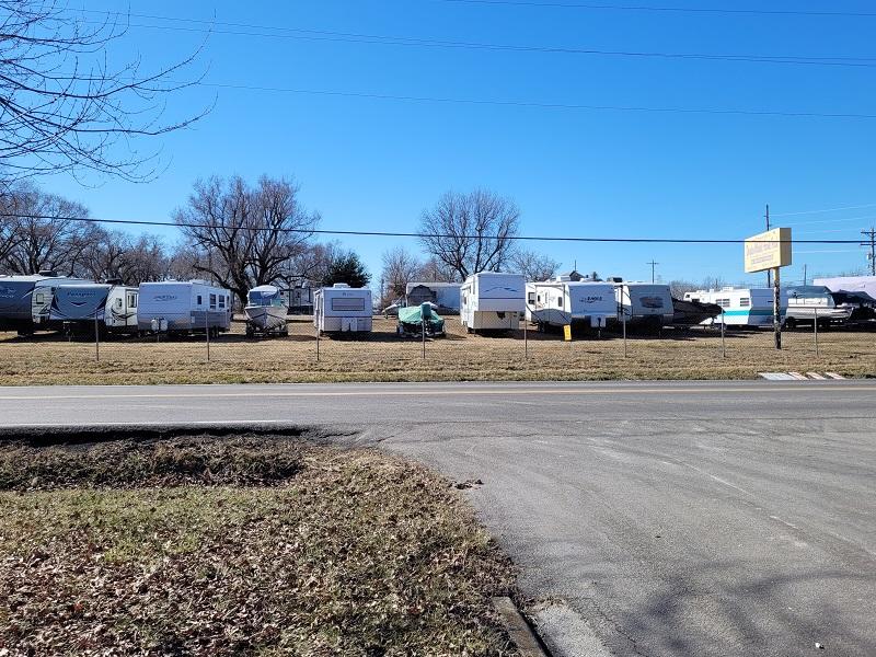 This property is located at the SW corner of Walnut Lawn and Scenic.  It is currently being operated as a mobile home park as well as outside storage of RVs and boats.  The front (northeast approx 1 acre) corner is already zoned C-2 and the County is receptive to a rezoning of the balance of the property in connection with the redevelopment of this site.  All the Mobile homes and structures will be removed by the owner in connection with this sale.  City sewer and water as well as natural gas and electricity are already on the site.  The back (west) edge of the property is adjacent to a greenway trail which also benefits redevelopment.  Possibilities include apartments, retail strip center, C-store, office center, etc.