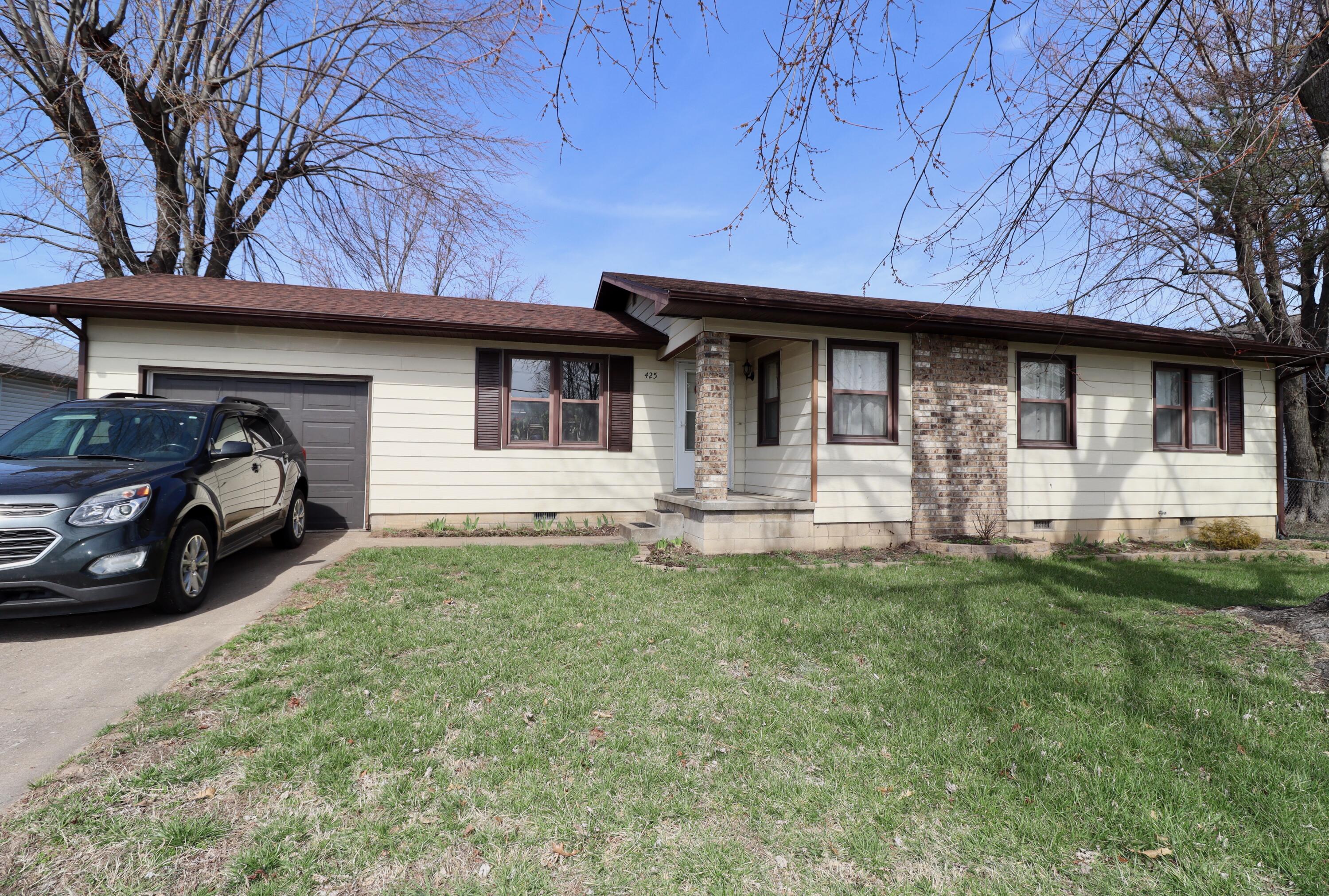 Looking for a spacious and inviting property in Bolivar, MO? Look no further than 425 W Aldrich! This fantastic home offers three generously sized bedrooms, two beautifully appointed bathrooms, and a generous 1,144 square feet of living space.Inside, you'll find a welcoming living area that's perfect for entertaining friends and family, and with three bedrooms, there's plenty of room for everyone to have their own space to relax and unwind.Outside, the covered patio is the perfect spot to enjoy the fresh air and sunshine, and with a large, fenced in yard you'll have all the room needed for kids or pets. The front circle driveway provides all the space for friends and family to park for get togethers.Located in the heart of Bolivar, this home is just minutes from all the best shopping, dining, and entertainment options. You're also just a block from SBU!!! So if you're looking for a fantastic property that offers everything you need to live your best life, look no further. Call to schedule a showing today!
