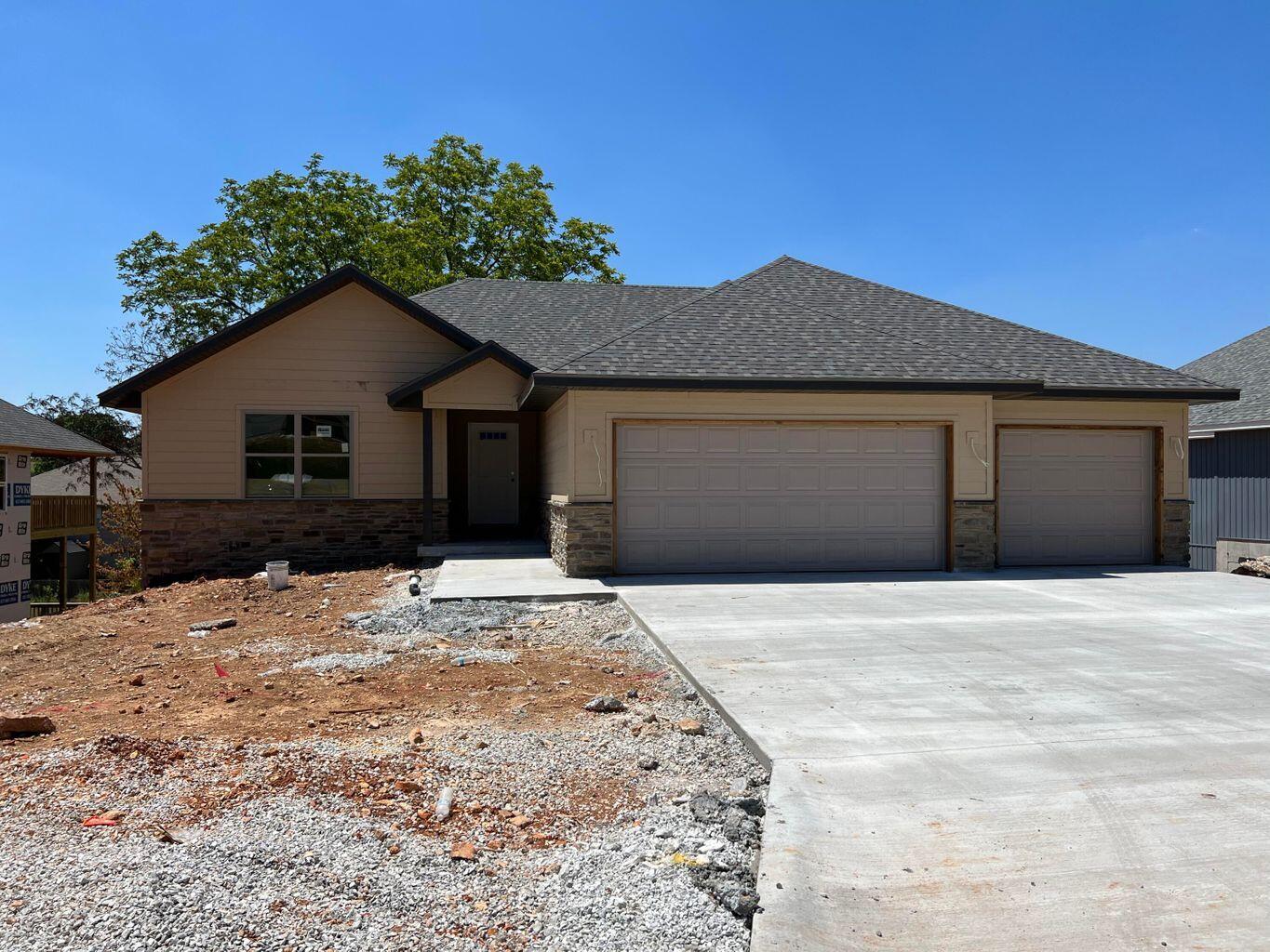 Brand New Walkout basement in Ozark! This beautiful home offer a great open floor plan that offers, white cabinets with granite counter tops and stainless appliances. Engineered floors flow throughout the main floor with carpet in the bedrooms and Tile in the baths and laundry. There is 3 bedrooms on the main floor including the large master suite with a walk-in closet, double vanity and walk-in shower. The basement is hangout central with a large living area, wet bar and 2 more bedroom or you could have a media/game room in the huge fifth bedroom. Located in the new Elk Valley subdivision with easy access to 65hwy.