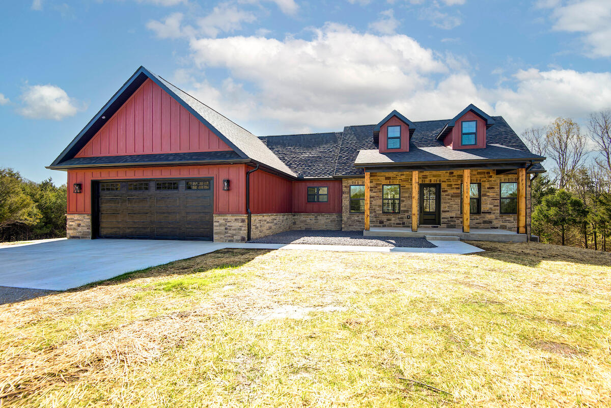 If you're looking for Location - Setting - and Quality on a few acres this is it... 4 bedroom 3 bath full walkout basement home on over 3 acres... Features include : Private well - wooded setting - LP smart siding - 26 x 10 Large covered rear deck with composite flooring - Quartz countertops with center island - Large walk in pantry - Engineered Hardwood flooring - Vaulted ceiling with stone gas fireplace - Full finished walk out basement with second living area and wet bar - Heated and cooled John Deere room... Rogersville schools...