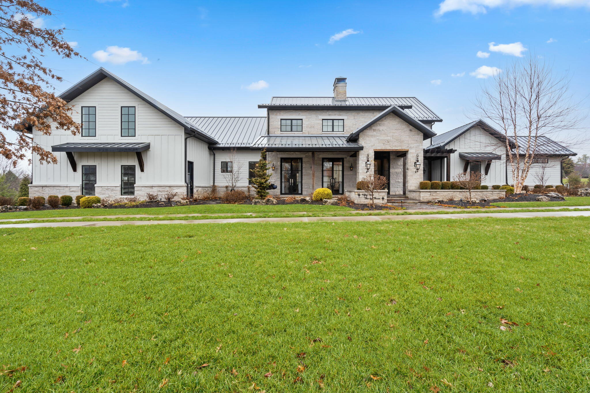 Stunning 7600+ SF in Highland Springs, Springfield's only private and gated residential golf community.  Offers beautiful high end finishes, tons of natural light and so much attention to detail throughout!  Foyer leads into a 2 story living room with beamed ceilings and tumbled stone fireplace. Kitchen has tons of cabinet space, handmade tile backsplash from England, 17' island with plenty of seating, commercial grade appliances, coffered ceiling, hidden walk-in pantry with beverage fridge and sink.  Master bedroom with large en-suite bathroom with his and her vanities, soaking tub, walk-in tiled shower with two shower heads and a huge walk-in closet with built-in shelving and its own W/D hookups.  Main level has a second living area with fireplace, an additional bedroom with its own full bathroom, formal dining room, office, half bath, and oversized mud/laundry room with plenty of shelving and cabinet space.  Upstairs has a sitting area and 2 bedrooms each with their own bathroom.  The basement has the 3rd living area with fireplace, a recreation room, a wet bar with microwave, sink, and beverage fridge, a half bathroom, the 5th bedroom with its own full bathroom, plus an unfinished area perfect for storage.  Over the garage is an exceptional amount of attic space that can provide additional living space. Home sits on nearly an acre lot with a huge circle drive, 4 car garage with Tesla charging station, multiple covered patios, extensive landscaping, irrigation system, and invisible fence.  Call to schedule your private showing today!