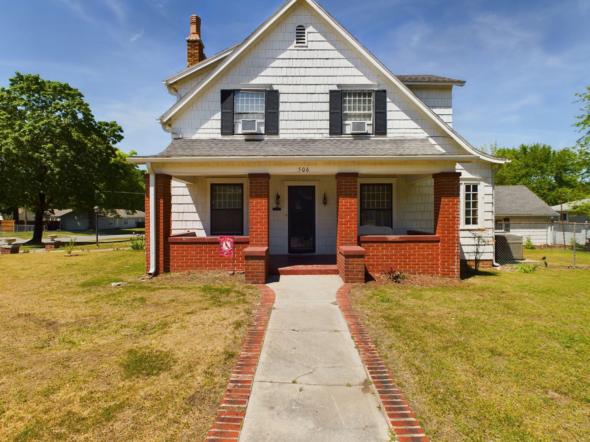 THIS HOME IS LOADED WITH CHARACTER. IT BOASTS A LARGE CORNER DOUBLE LOT, WITH PLENTY OF ROOM FOR ENTERTAINING AND GARDENING. THE INTERIOR OF THE HOME FEATURES BEAUTIFUL WOODWORK, A LARGE LIVING ROOM, FORMAL DINING ROOM, A STUNNING SUNROOM WITH STONE FLOORING. AND TWO COVERED PORCHES TO ENJOY THE OUTDOORS