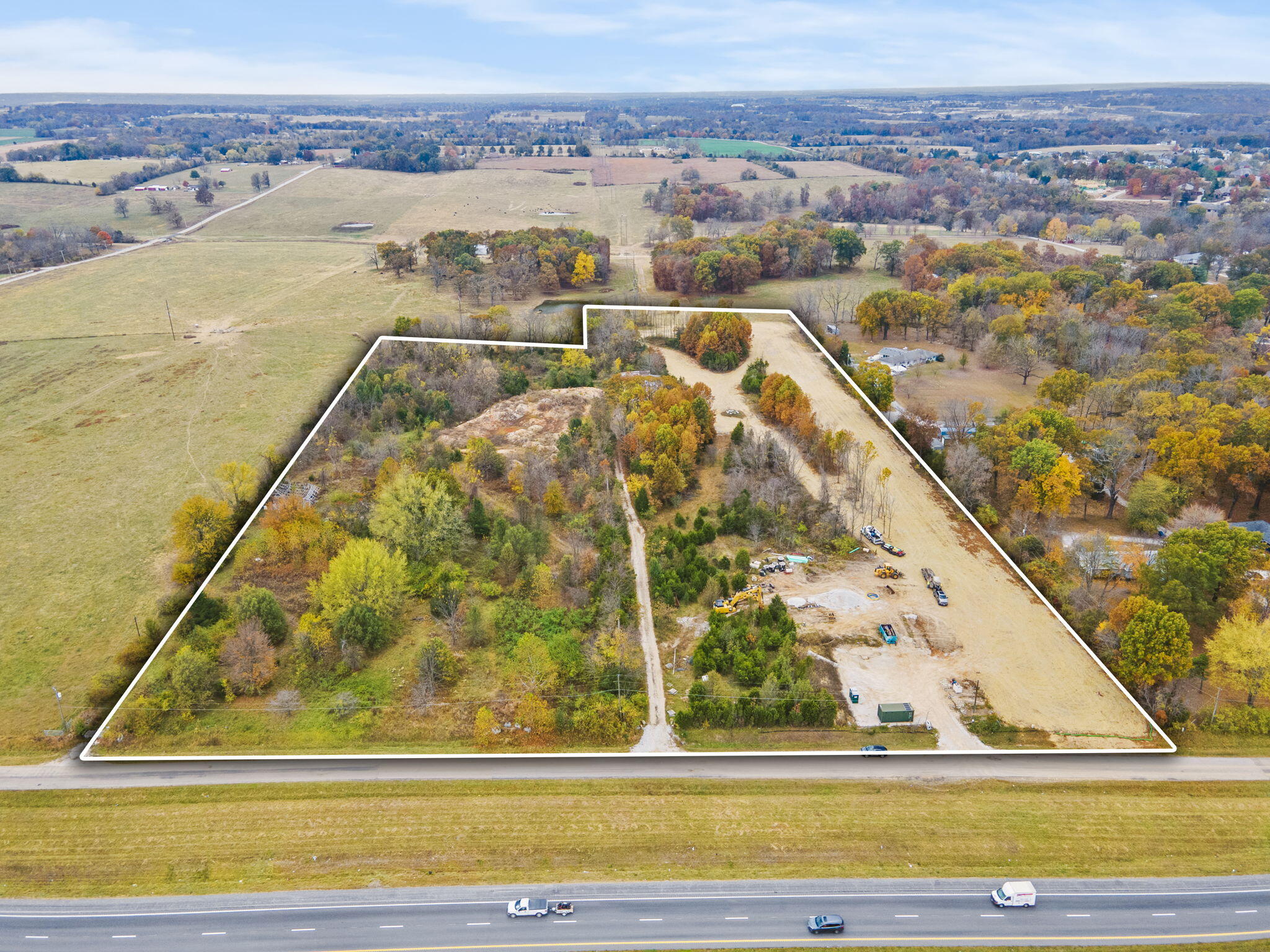 14.88 +/- acres of Greene County land near Highland Springs Country Club! Zoned PAD, this acreage has quick access to Hwy 60, a Rogersville address, and sits just outside city limits. Composed of 2 parcels, one has been significantly cleared and there is a central driveway between the two lots. Over 650' of street frontage.