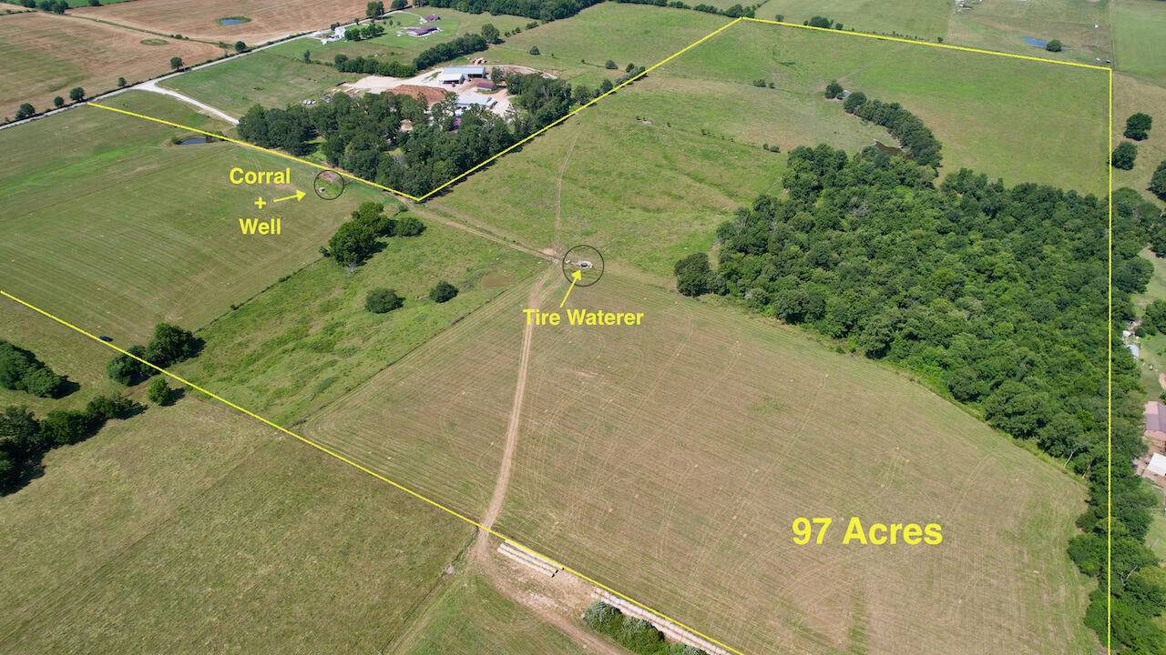 Don't miss this prime piece of land - 97 acres with 90% of it as open pasture.  Excellent for building your future home and growing your family farm.  There is already an established well.  The property comes with two automatic tire water tanks that separate pastures as well as two 2 ponds and a set of cattle corrals.  The fence is in great shape and relatively new.