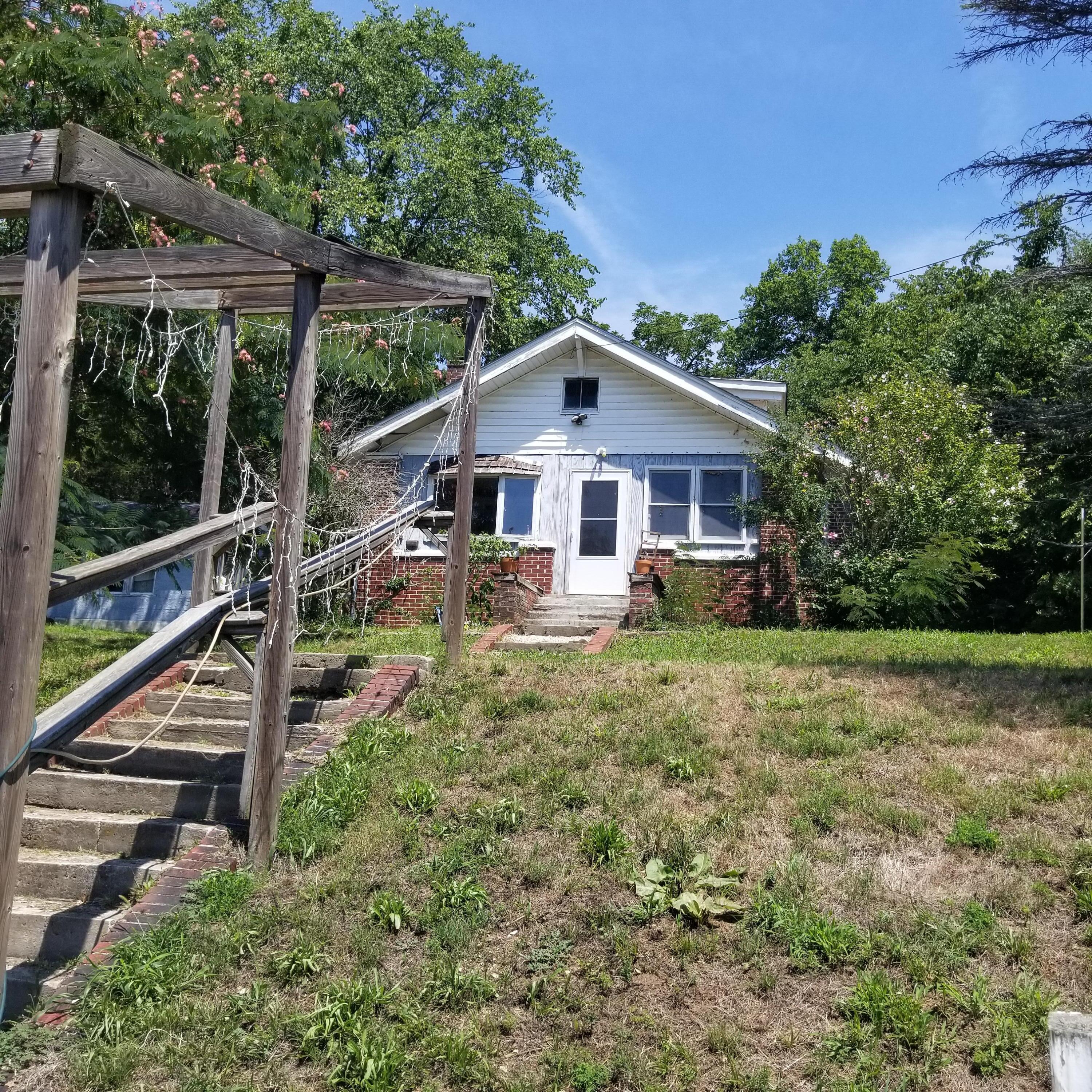 Opportunity awaits , home with 16.6 acres located right on Hwy 413 in Galena. Home is Vacant and needs TLC. some wiring has been repaired to Well house to pump recently. Property being sold AS IS .  All Electric, private Well and septic . Septic has been cleaned out  in the fall of 2021.  3 Bedrooms, 1 Bath, Detached single car garage, storage buildings, chicken coop, wooded acreage behind home.