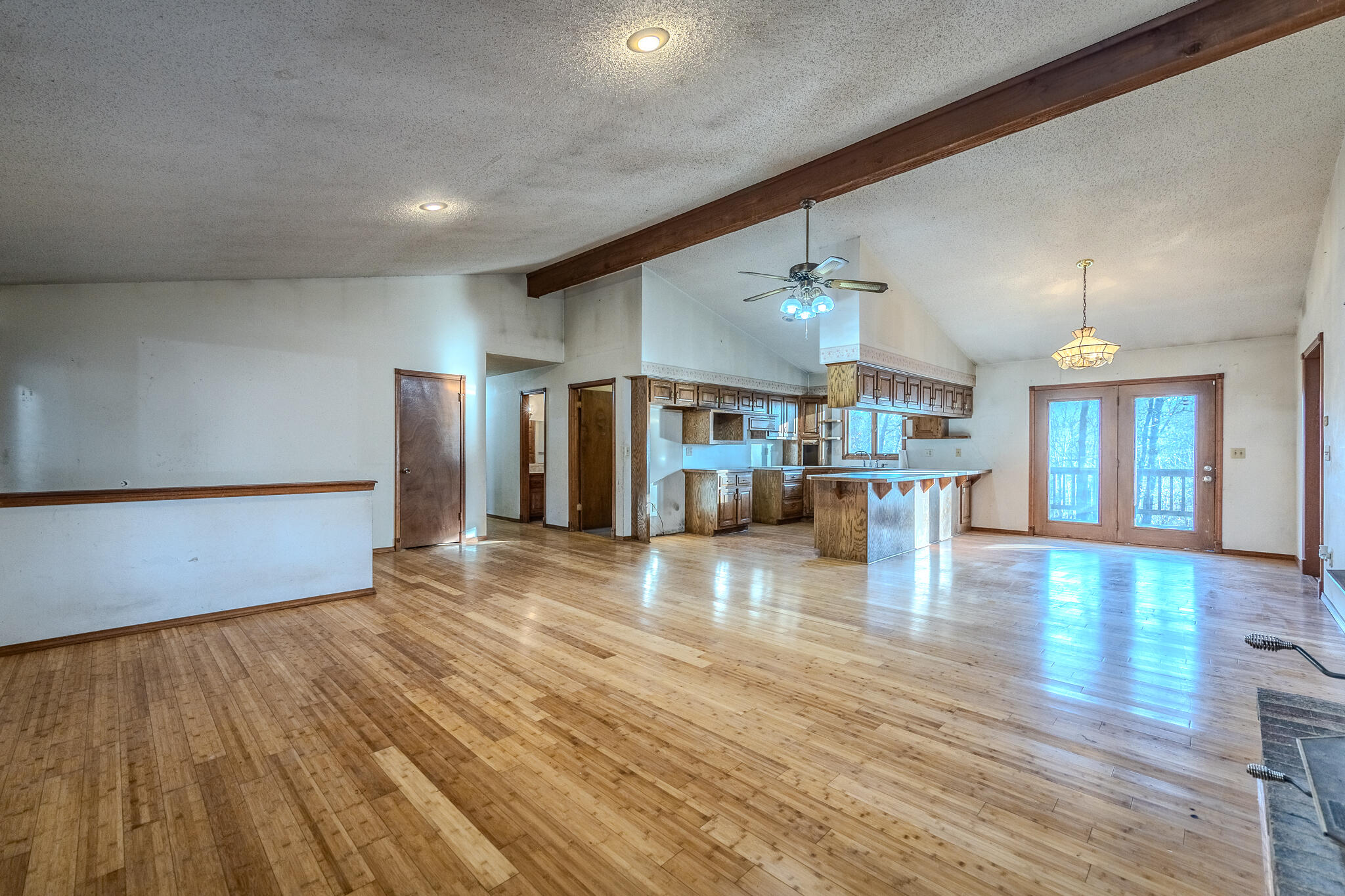 Desirable LOCATION plus ACREAGE just a couple miles east of Springfield. This property includes 20 wooded acres with rolling terrain and mature timber. It has an all brick home with 3 bedrooms, 3 baths. The full-size walkout basement has lots of space along with a storm shelter and non conforming room. The main level has an open floor plan with vaulted ceilings. The killer view off the back deck is a bonus!