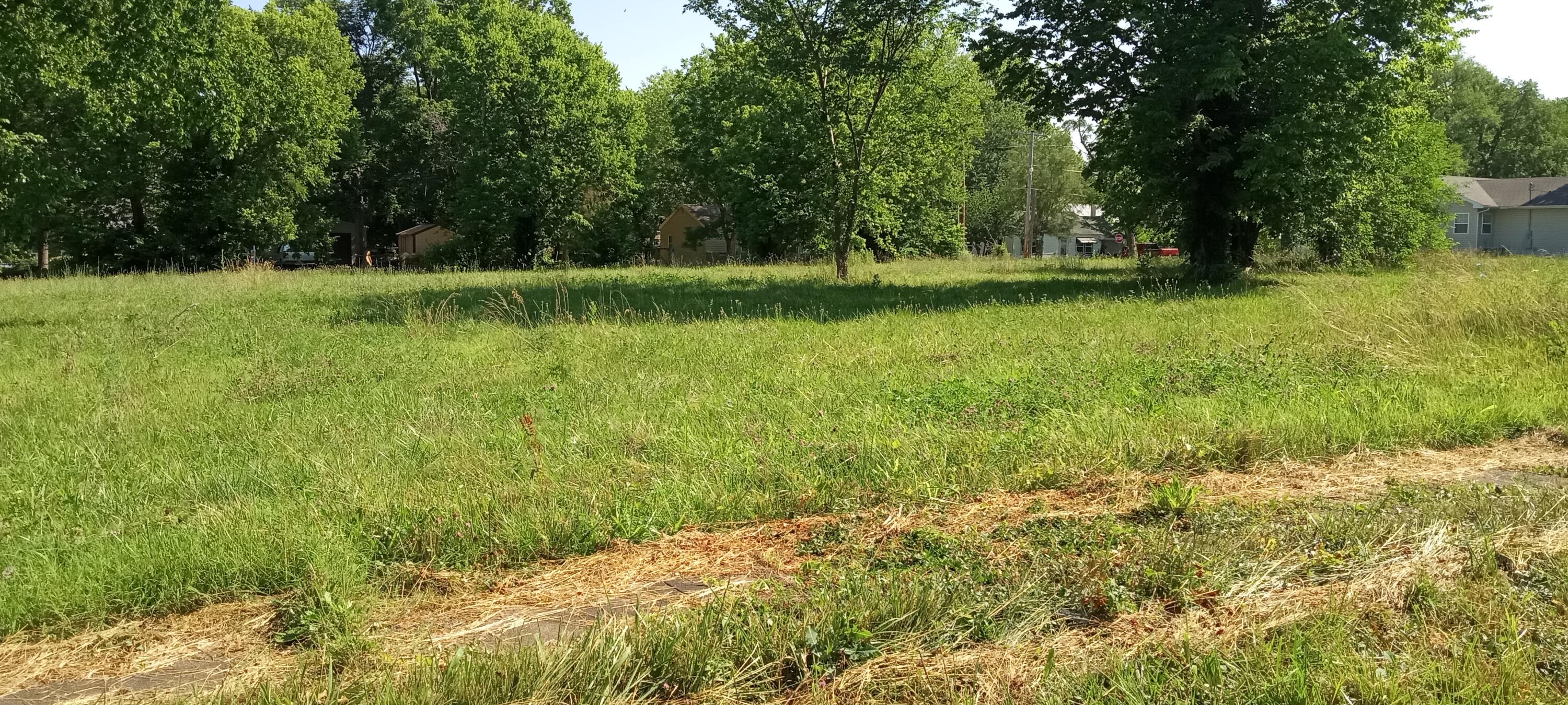 Own your own city block!! This is 2 partials which make up a whole block. This property  could accommodate 4 single family homes.  Duplexes would also be allowed. Buyer or buyers agent to do own due dilligence with city for zoning and set backs. 1 block 1 price. Don't miss out on this rare opportunity.