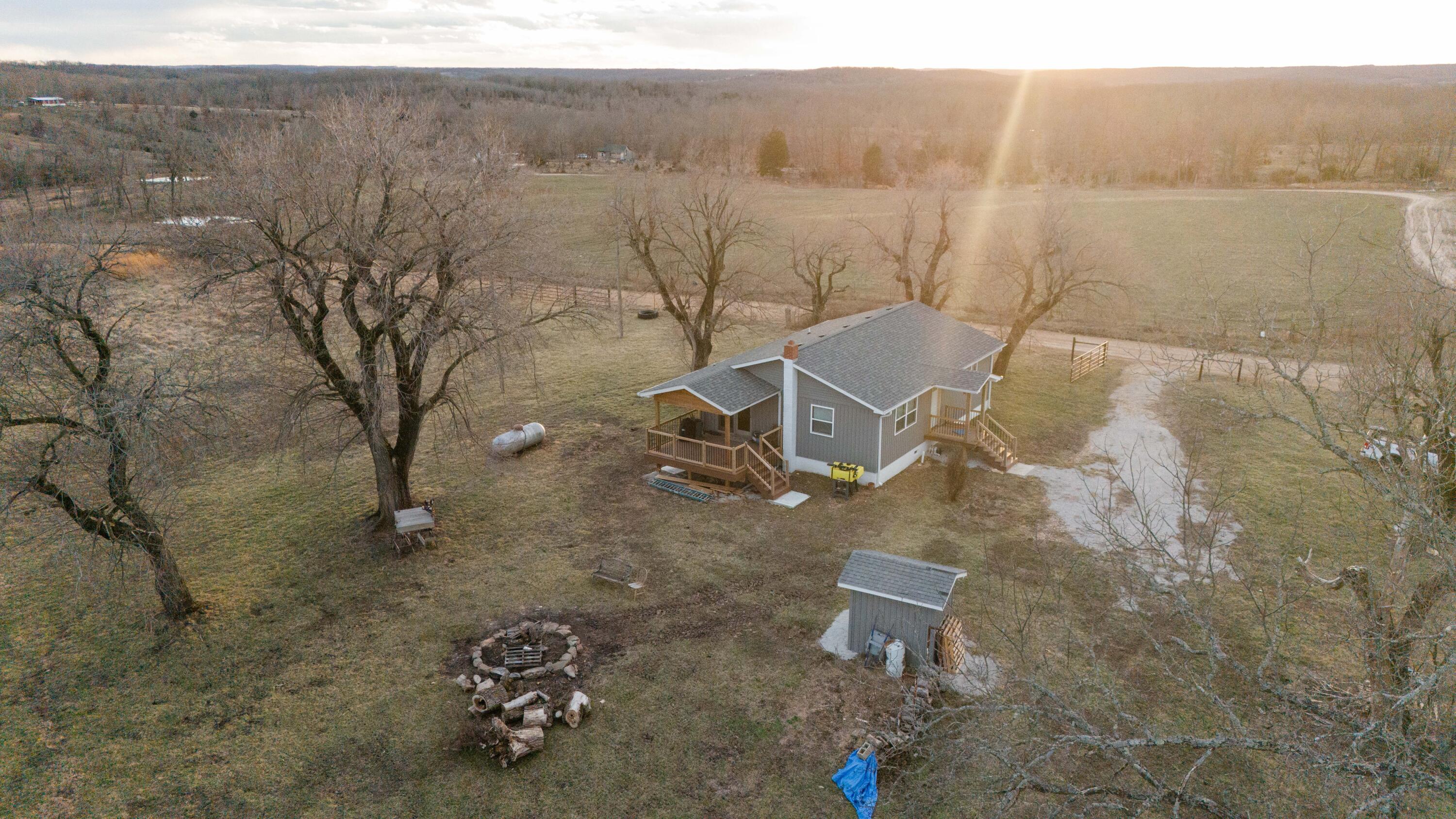 Discover the ultimate hunting sanctuary on this pristine 230-acre farm, featuring a fully renovated farmhouse. Embrace the serenity of nature amidst 5 meticulously maintained food plots and 3 tranquil ponds dotting the landscape. This haven boasts premier hunting grounds, teeming with abundant deer, turkey, and small game. Unleash your passion for the outdoors in this idyllic retreat, where adventure awaits at every turn. Experience rural living coupled with unparalleled hunting opportunities on this extraordinary property. Additional 140 +/- acres available for purchase.