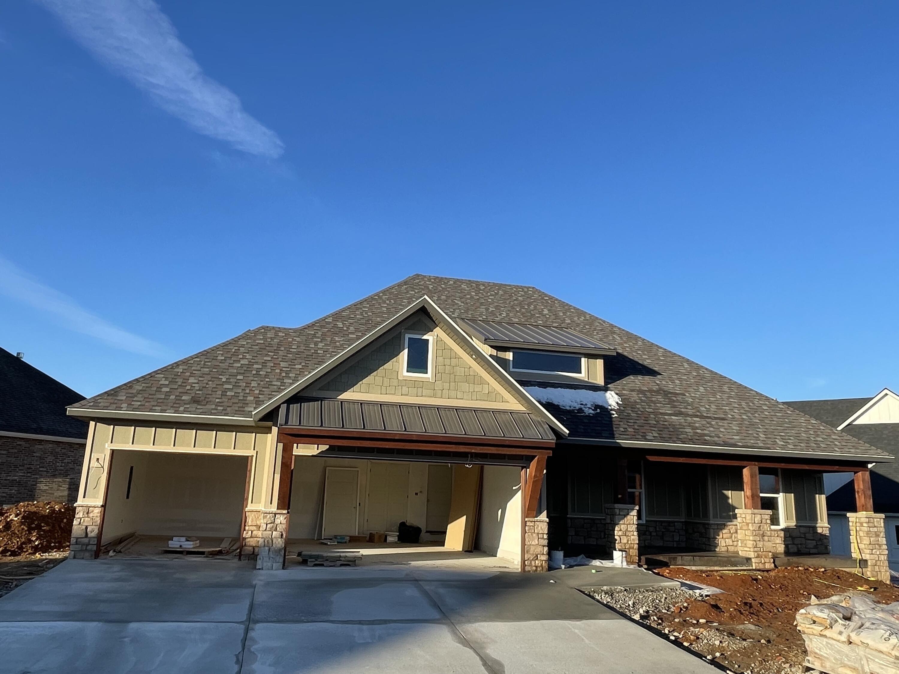 This Home is raising the bar. With so many beautiful as well as energy savings upgrades. Starting with the stamped concrete, gorgeous beam work inside and out. This home has custom cabinets, wood shelving in all closets and pantry. With being a spray foam installed residence you will save on utilities as well.This Home will make you proud. Located in The village of Wicklow with tasteful standards, and wonderful community feel. Don't miss out on this beauty in the award winning NIXA school distract, and the 4TH safest City to live!!!!
