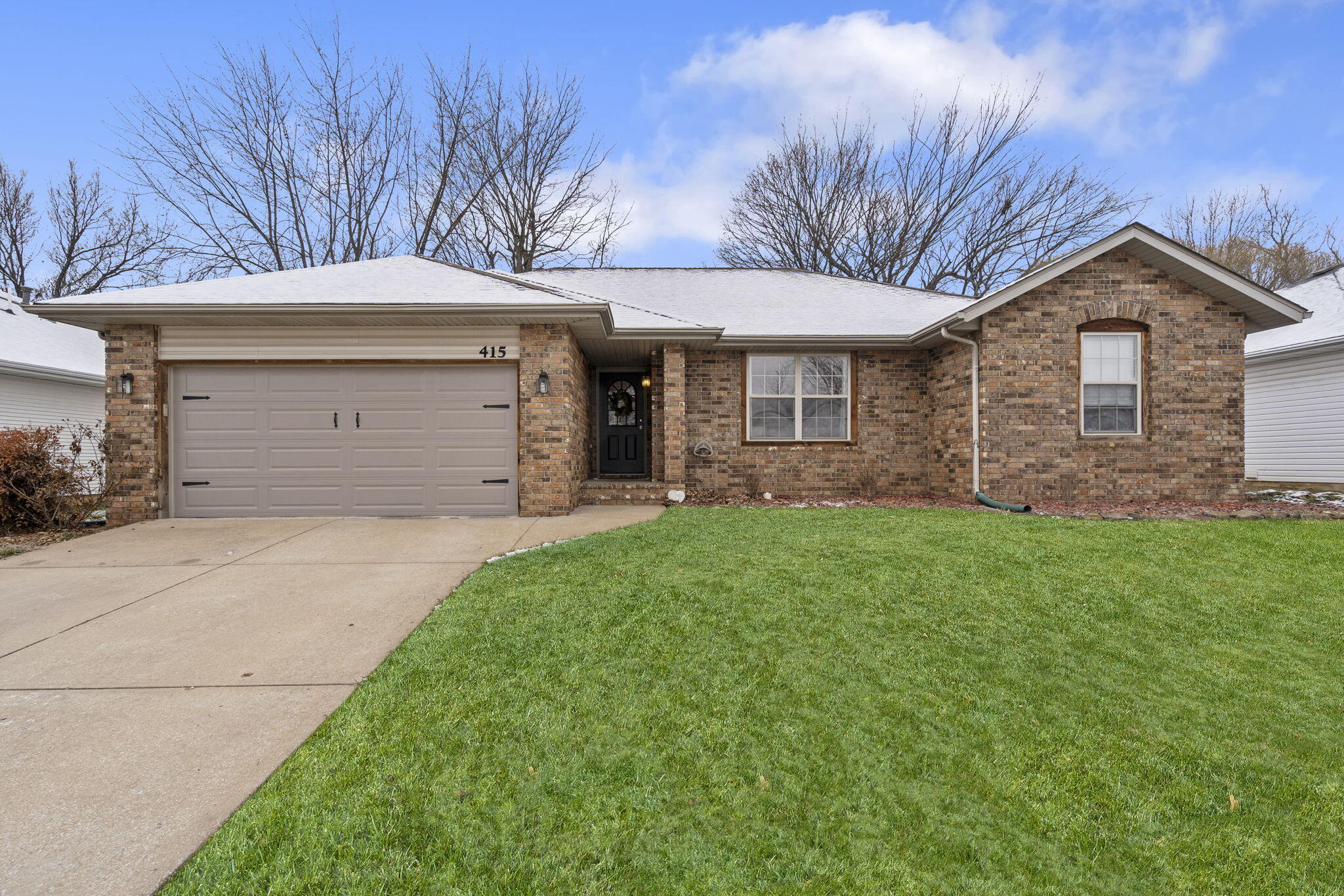 Come see this beautiful home in an established neighborhood! A lovely split floor plan, 3 bed/2 bath, which includes a master bedroom with two sink vanity bathroom and a spacious walk-in closet. Fireplace in the first living room, with access to the fenced in back yard and patio/entertaining area in the second living room. Large kitchen with dine in area, plenty of cabinet space throughout! Two car garage provides plenty of parking/storage space. Willard School District, but with Springfield conveniences!