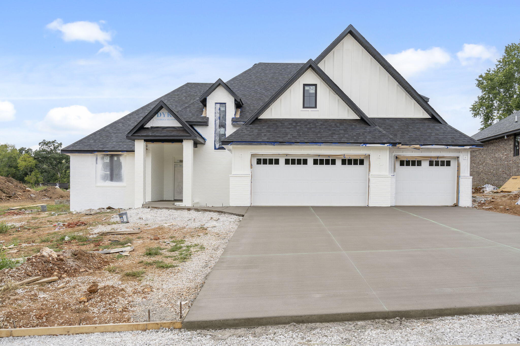 New gated subdivision on Springfield's East side with access to Hickory Hills Country Club! This stunning, zero entry, new construction home offers open layout, living room with tall ceilings, & gas fireplace. Kitchen has large center island with seating space, quartz counter tops, large walk-in pantry and dining area. Split bedroom floor plan features spacious master suite with dual sink vanity, walk-in shower & walk-in closet with access to the laundry room and mudroom. Bedrooms 2 & 3 share a full hall bathroom with a powder room off the kitchen for guests. Upstairs is a 2nd family room with study nook, the 4th bedroom, and a 3rd hall bathroom. Covered porch out back and a sodded yard and irrigation system.  Quick and easy access to Hwy 65!