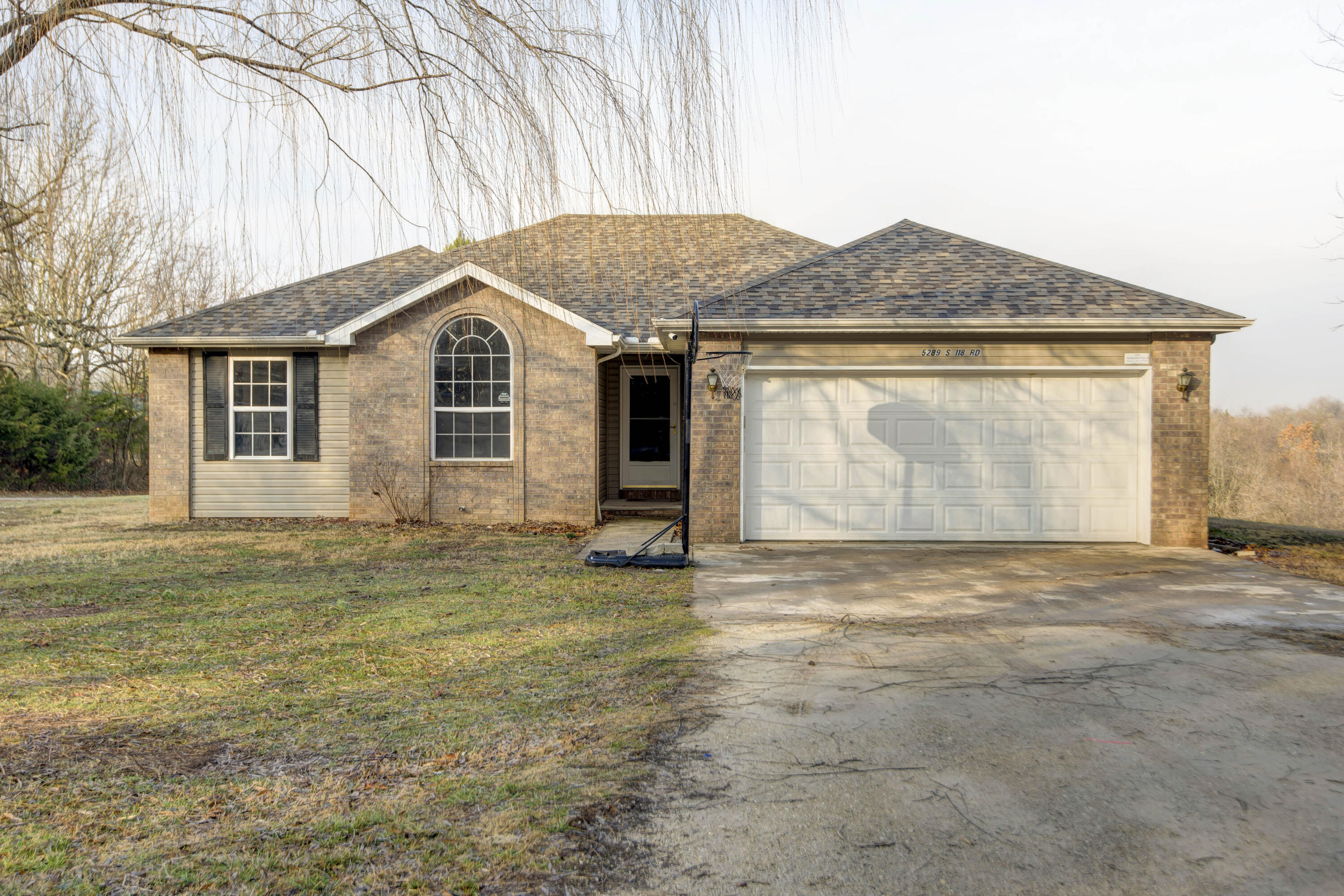 Welcome to this beautiful one level home situated on 1 beautiful acre. This home features 3 bedrooms, 2 bathrooms, and a 2 car garage with a NEW ROOF installed in 2021, and new HVAC installed in 2020. You'll love the high ceilings as you enter the home, windows in the living room that leads to panoramic views, beautiful arched bedroom windows, jetted master bathtub, large walk in closets, big laundry room, and more! The appliances are also newer and includes washer and dryer! You'll enjoy the sense of calmness and serenity as you sit on the screened-in porch, overlooking the gorgeous land setting. This is a truly one of a kind, beautiful country living with easy access to the highway. Schedule your showing today!