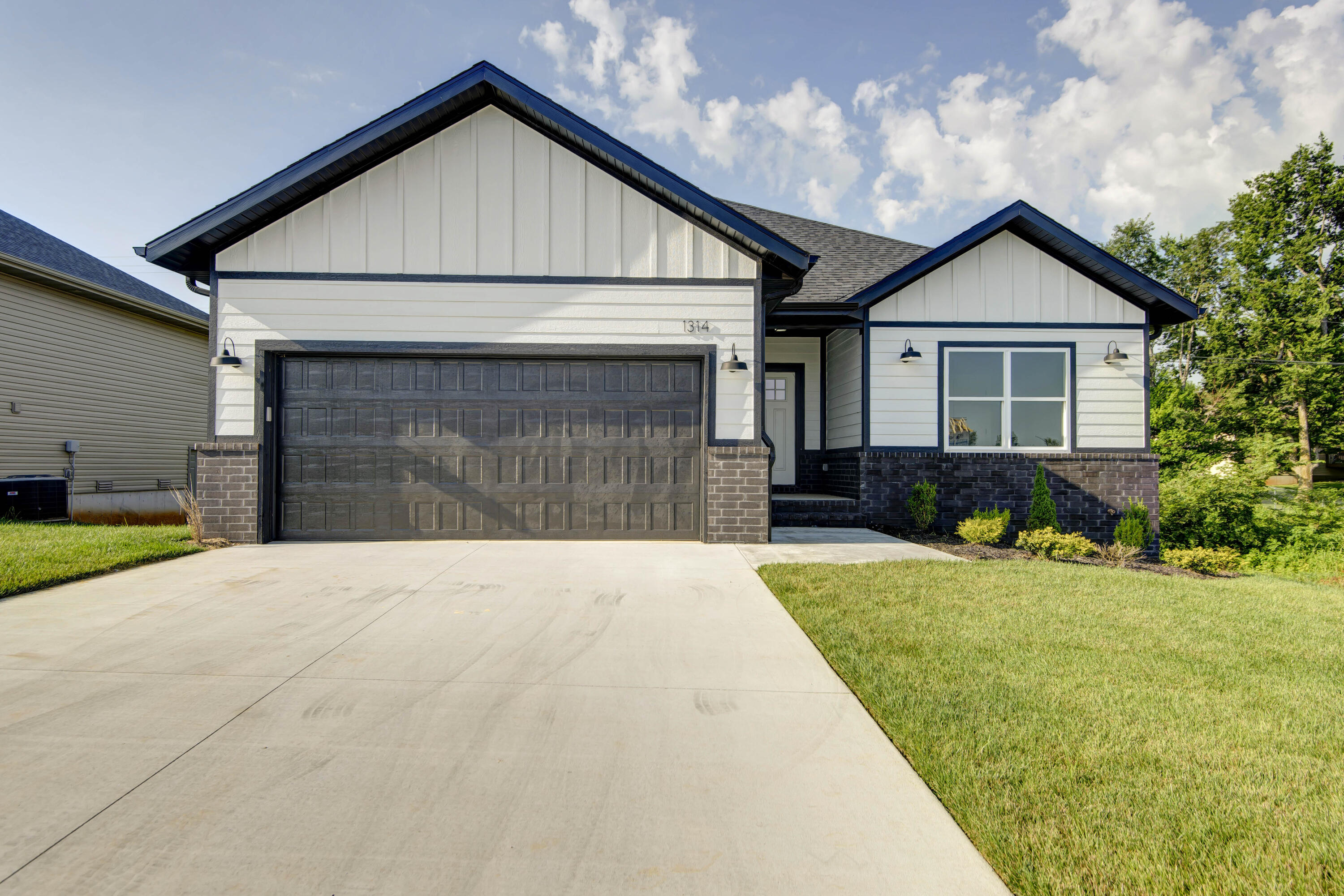 New Construction!. Brand new 3 bedroom, 2 bath home with custom cabinets and granite counter tops.  Walk in pantry.  NO CARPET  Split bedroom floor plan.  Engineered hardwood.  Tile shower in master. Very open floor plan.  Gas stove in kitchen.  Sodded front and side yards with sprinklers.