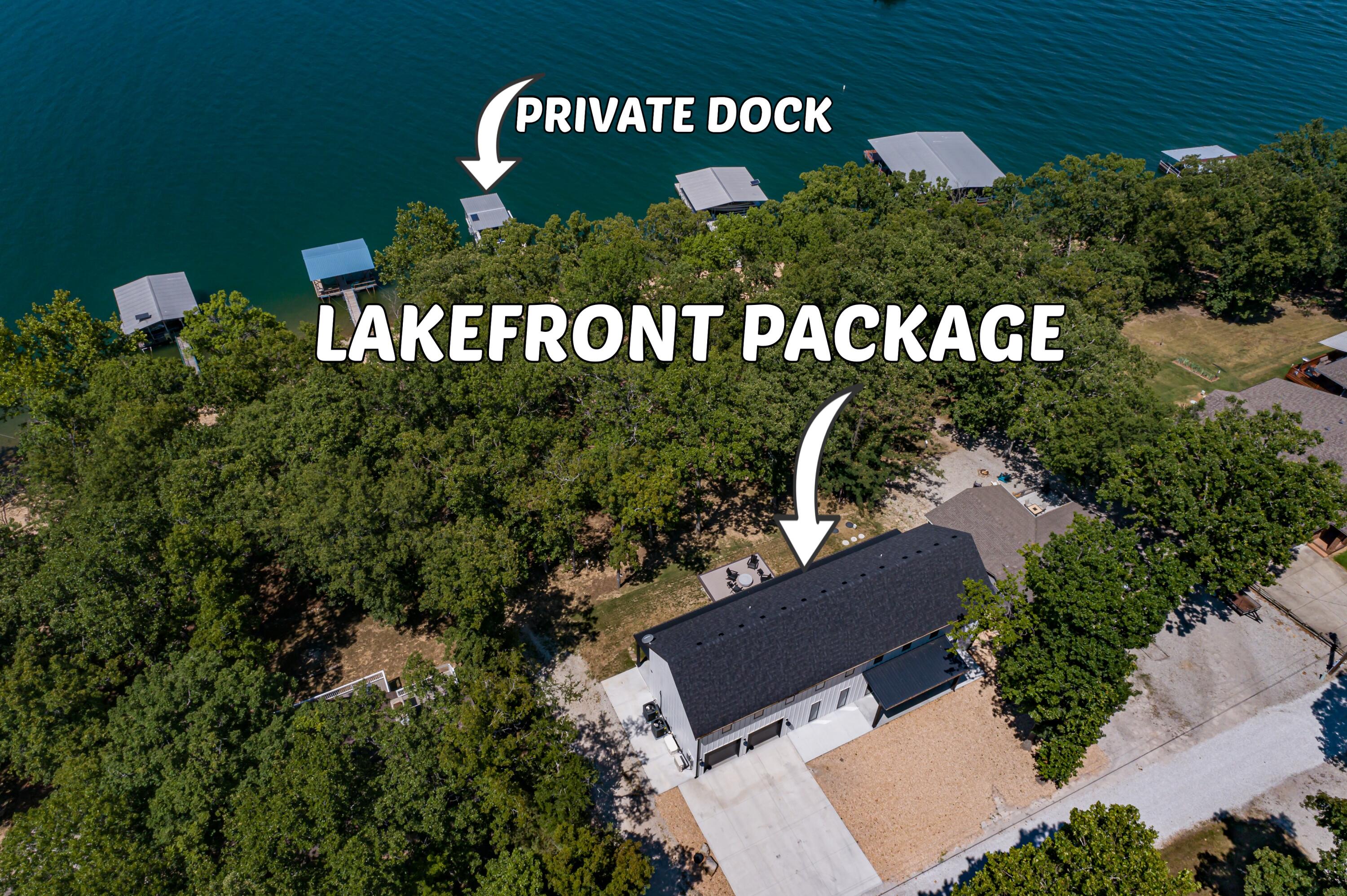 Lakefront and lake view home with private dock included on the shoreline less than 200 feet away and within sight of the home.  Additionally, the home is furnished, including electronics, and ready for you to enjoy lake time.  Contemporary style home built in 2022 and designed with a focus on enjoying lake life. The main level features towering ceilings and windows that capture the view of the lake and outdoors. Upstairs you'll find 4 bedrooms and 3 full baths so there's room for family and friends.  Picture yourself on summer afternoons enjoying the back deck while watching the kids playing off the swim platform on the dock and then on those cooler evenings gather around the gas firepit on the deck to share memories. The private dock, included in the price, is solar powered and features a 10' x 24' boat slip, swim platform and an attached floating PWC dock. Plus, you don't find very many places on Table Rock Lake where the slope of the path from the home to the dock is as easy as you find with this property.  This is a convenient location on the lake and by land it's just a short distance from shopping necessities.  You don't want to pass up this amazing lakefront package deal.