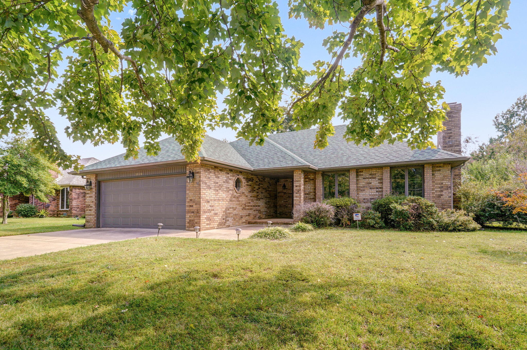 Welcome to Primrose Place where this quiet neighborhood boasts of beautiful homes, mature trees and a great location close to shopping & restaurants. This all brick beauty has so much to offer! New roof in 2023, HVAC new in 2021, new wood laminate and new stove & dishwasher. The living room features a brick gas fireplace & vaulted ceiling. The oversized dining area leads to the kitchen with an abundance of cabinetry. The master bedroom offers a walk-in closet and second bathroom with walk-in shower. And you'll love spending time out in the covered screened-in patio. Plus a new deck has been added giving you a great place to grill & entertain. The large backyard has a full privacy fence plus full irrigation system. This home also comes with a security system w/cameras and a ring doorbell. The seller has taken great pride in this home! Call today to come see for yourself!