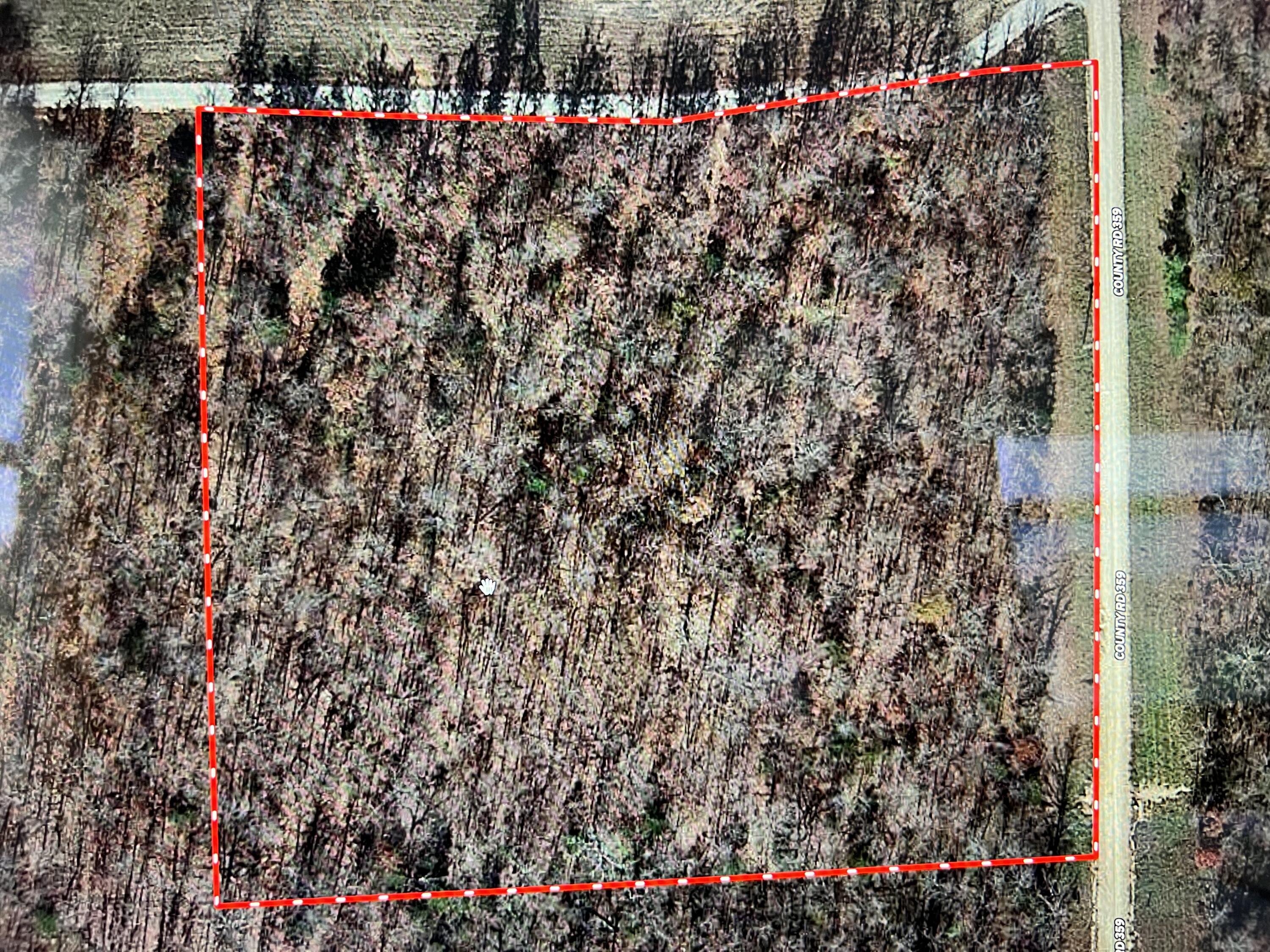 ACREAGE/HOMESITE  5 acres all in woods with a southern slope, fronting on county road plus a private road. In a new subdivision unrestricted. Only 3 miles from town. $25,000. Agent Owned
