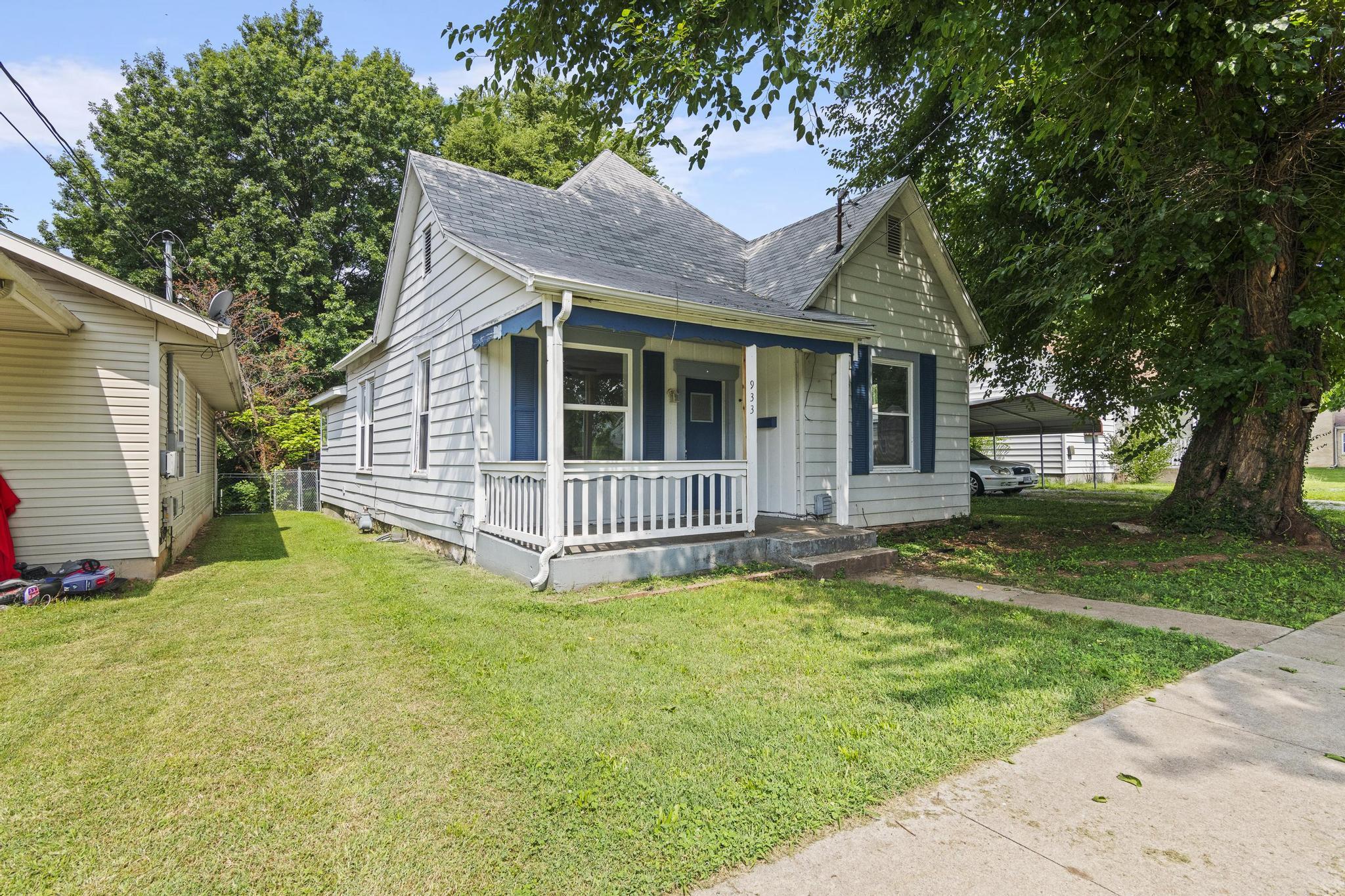 Perfect home for student housing being just blocks from Ozarks Technical Community College, Evangel University, Drury University and Missouri State University!  Would also make a great downsizing, first-time buyer or investment property. Home was previously rented for $1100 per month! Updated kitchen with all appliances staying.  Hardwood floors flow throughout living room, formal dining room and all bedrooms and were completely sanded and refinished last year! Overall, there has been over $25,000 in repairs and improvements to the home since February, 2023! Fenced back yard with alley access and massive patio, perfect for entertaining. Don't wait, call today for your private tour! Listing agent owns the selling entity. Owner/Broker