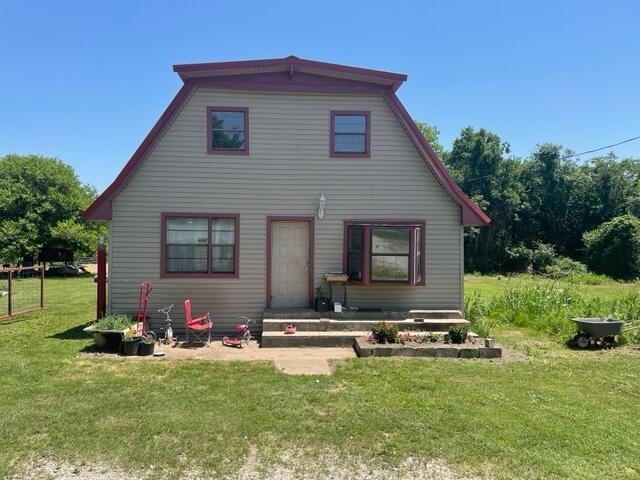 Upstairs is done!Great location and remodeled in 2018 including new roof, well, septic and the electric . All new appliances beautiful hard wood floors, barn doors and custom doors. 200 amp panel in home and also in the huge 6 door garage/shop/ whatever you want it to be! Upstairs bedrooms and bathroom Are now beautifully finished Lots of fruit trees, blue berries and the garden has already been planted. Property also has great size chicken coop. lots of baby chics,, laying hens, ducks, and a pig  can all convey with the property if buyer wants a producing homestead!