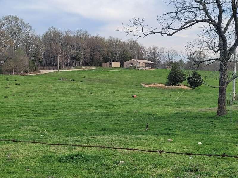 This 162 acre farm located in Douglas County has so much potential. With approximately 130 acres open and the rest in timber this farm has a large Barn/Shop with living quarters . The farm also has a nice barn corral setup that could be used for livestock needs of your choice. This property sets at the end of a private road providing great privacy and seclusion. The entire property is perimeter fenced and fencing is in good shape. This farm currently has been used for beef cattle but you can run the livestock of your choice . If hunting and looking for morel mushrooms is high on your list this property can provide both. Location of the property is another big bonus as you are only 15 to 20 minutes from Ava and only 45 minutes from Springfield Mo . And just a reminder There are no restrictions of any kind on this wonderful piece of the Ozarks.