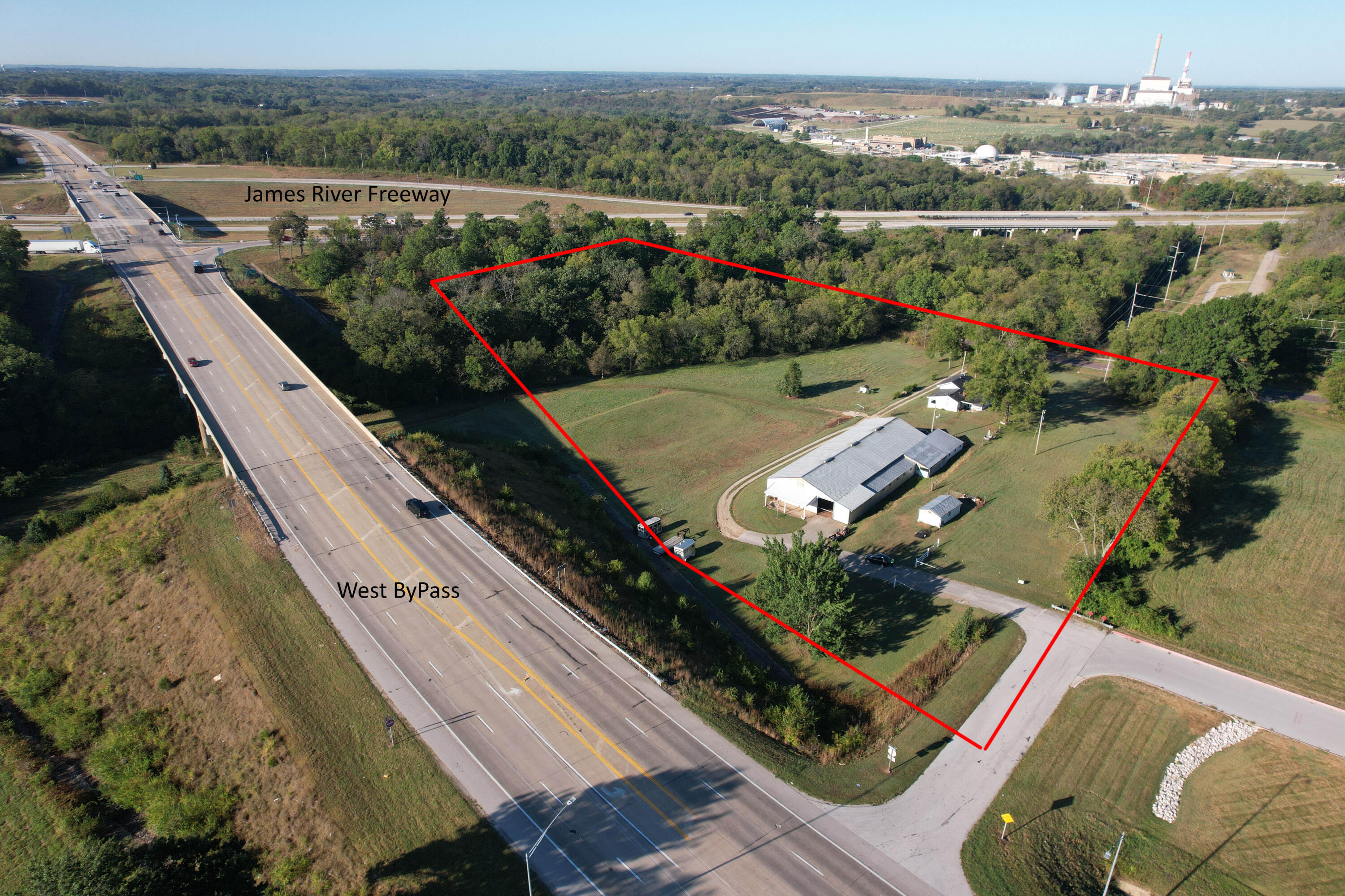 Now available, this primely located 7+/- acre tract at the convergence of heavily traveled James River Freeway/US-60 & Highway FF/West Bypass. The site features an attractive 3+/- acres of buildable, higher elevation ground with pole-sign visibility. A potential candidate for C-STORE, SELF STORAGE, MULTI-FAMILY, manufactured housing district, or destination office. The property also offers 4+/- acres of lower elevation ground that can serve as on-site retention, greenspace, or be filled and made buildable via LOMA.City Utilities sanitary sewer easement running through the Southern portion of the tract - with good elevation. Ozark Greenway Trails and South Creek - both within the lower portion of this property - offer inexpensive, aesthetically pleasing amenities to attract future occupants.Currently zoned Greene County R-1, the property is ripe for annexation & rezone for your project with Highway Commercial General Retail immediately adjacent. City of Springfield offers zoning classifications to multi-family developers that permit up to 40 units per acre.Site features Goss silt loam soil series known for being deep and well-drained. Property currently serving as an Equestrian property with charming home and 48'x160' horse barn and stables.